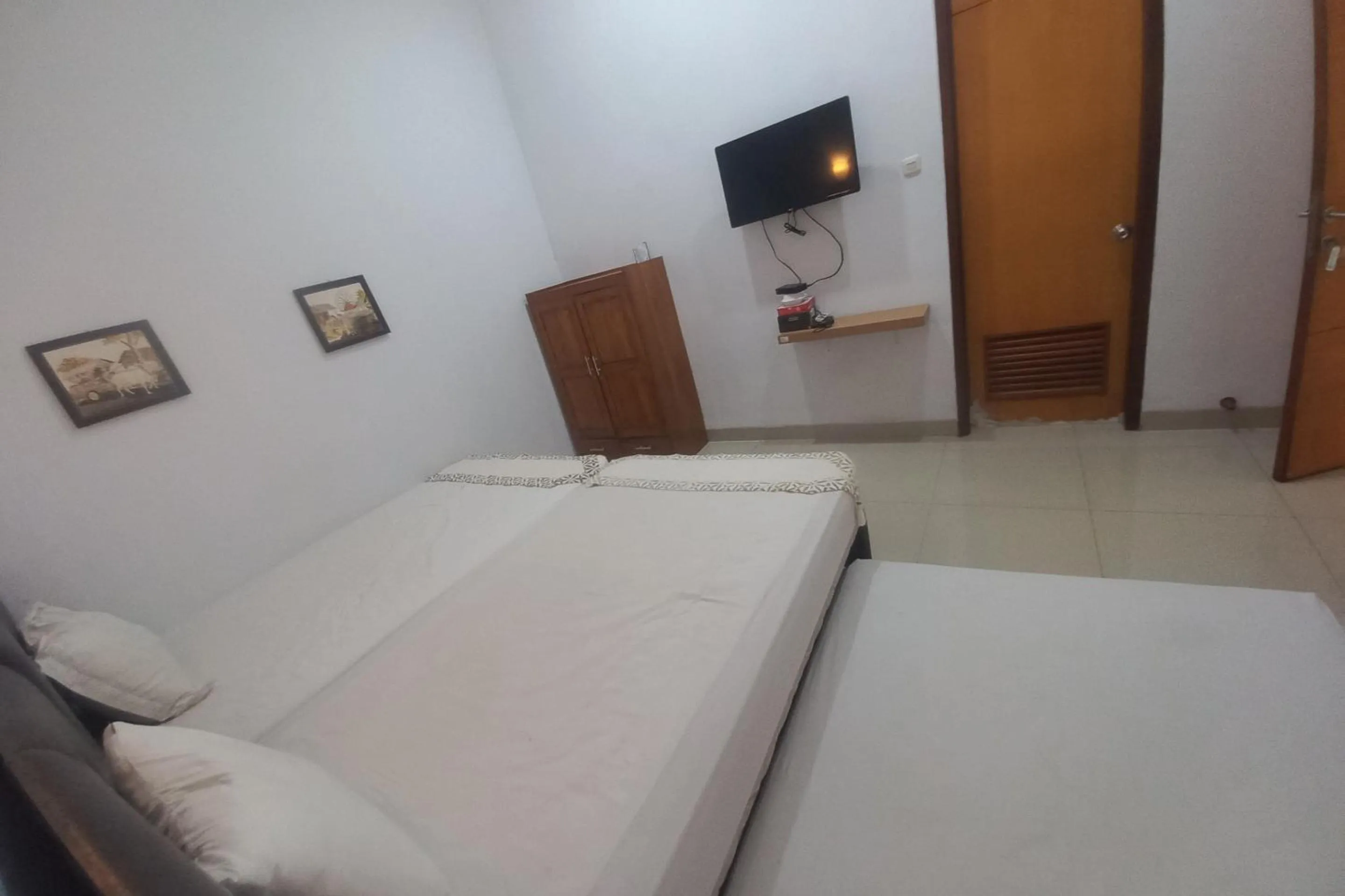 Bedroom, Bed in Capital O 93872 Natura Guest House Syariah Near alun alun kota purwokerto