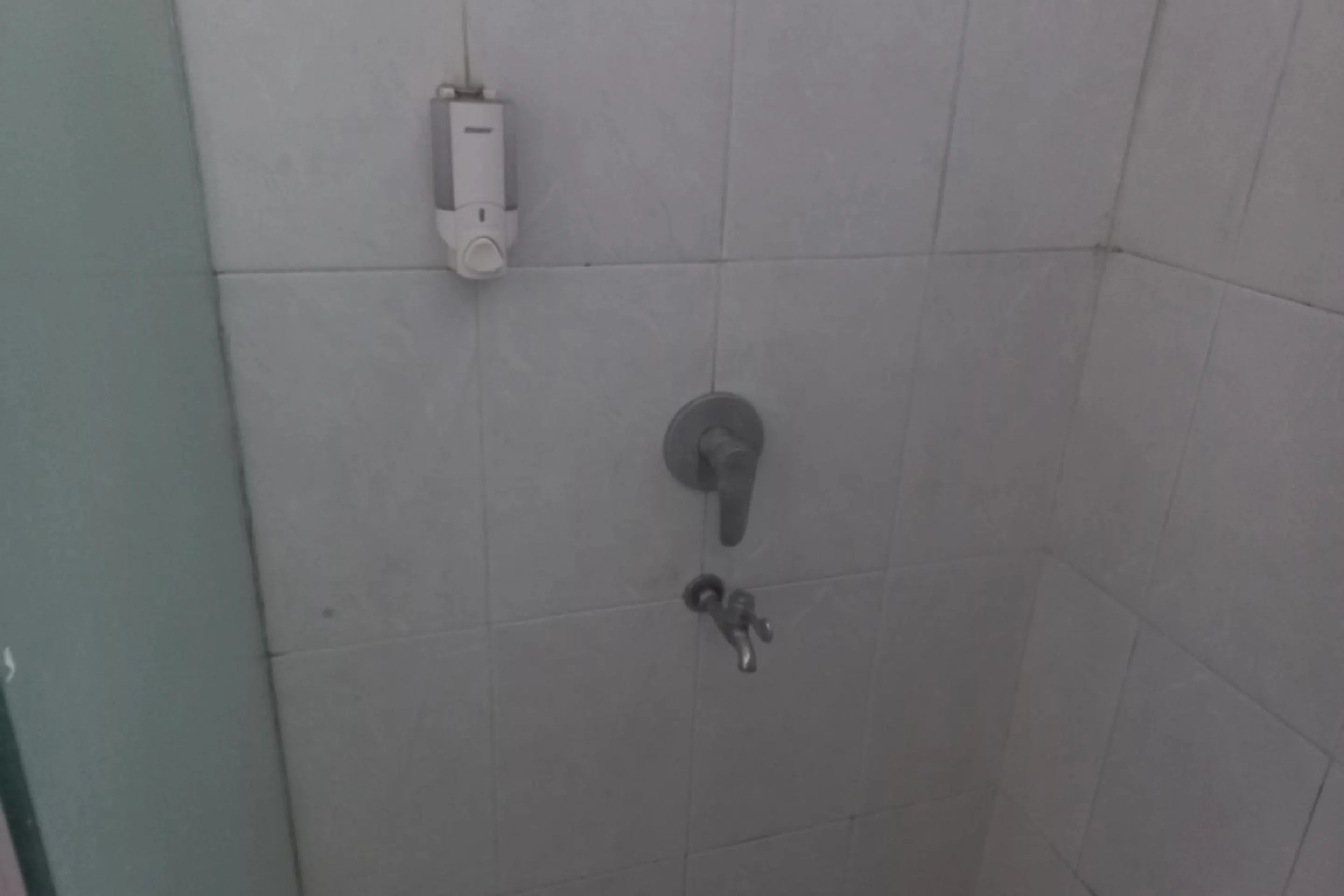 Bathroom in Capital O 93872 Natura Guest House Syariah Near alun alun kota purwokerto