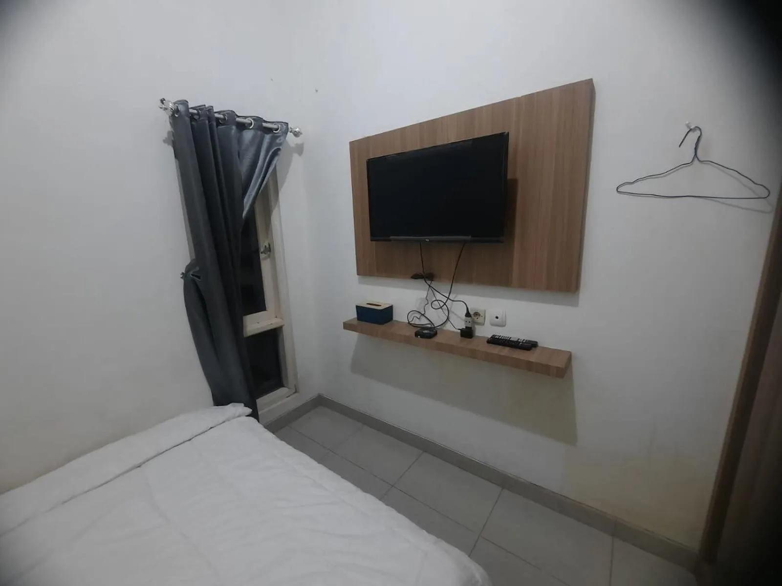 Bedroom in OYO 93870 Damai Guest House Cirebon