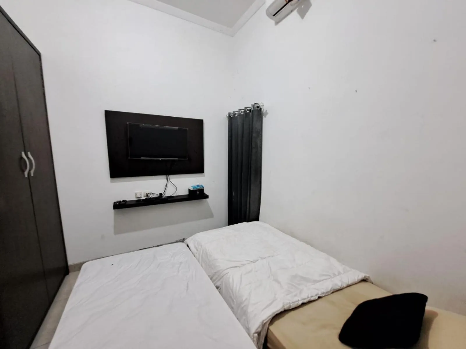 Bedroom in OYO 93870 Damai Guest House Cirebon