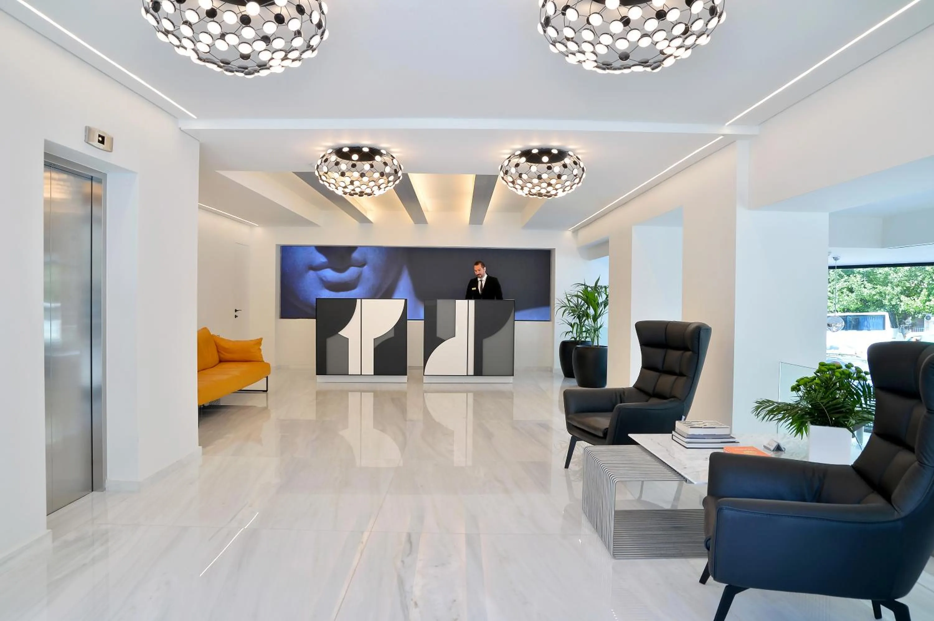 Lobby or reception in The Athenaeum Luxury Hotel