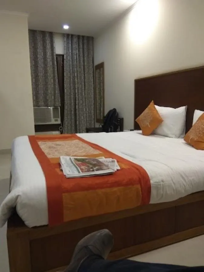 Photo of the whole room, Bed in Hotel Rainbow Ghaziabad