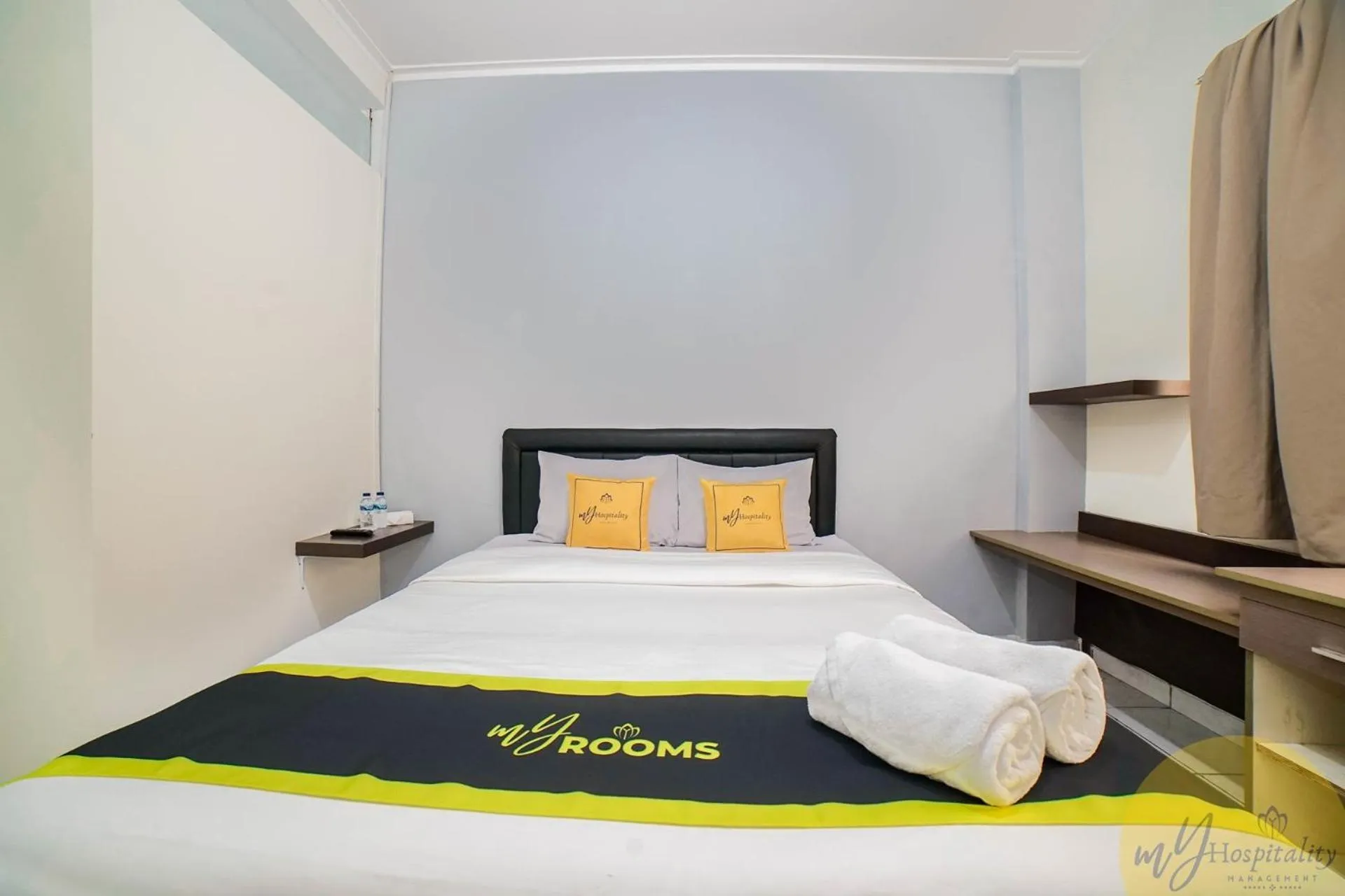 Bed in Fortuna Hotel & Residence by My Hospitality
