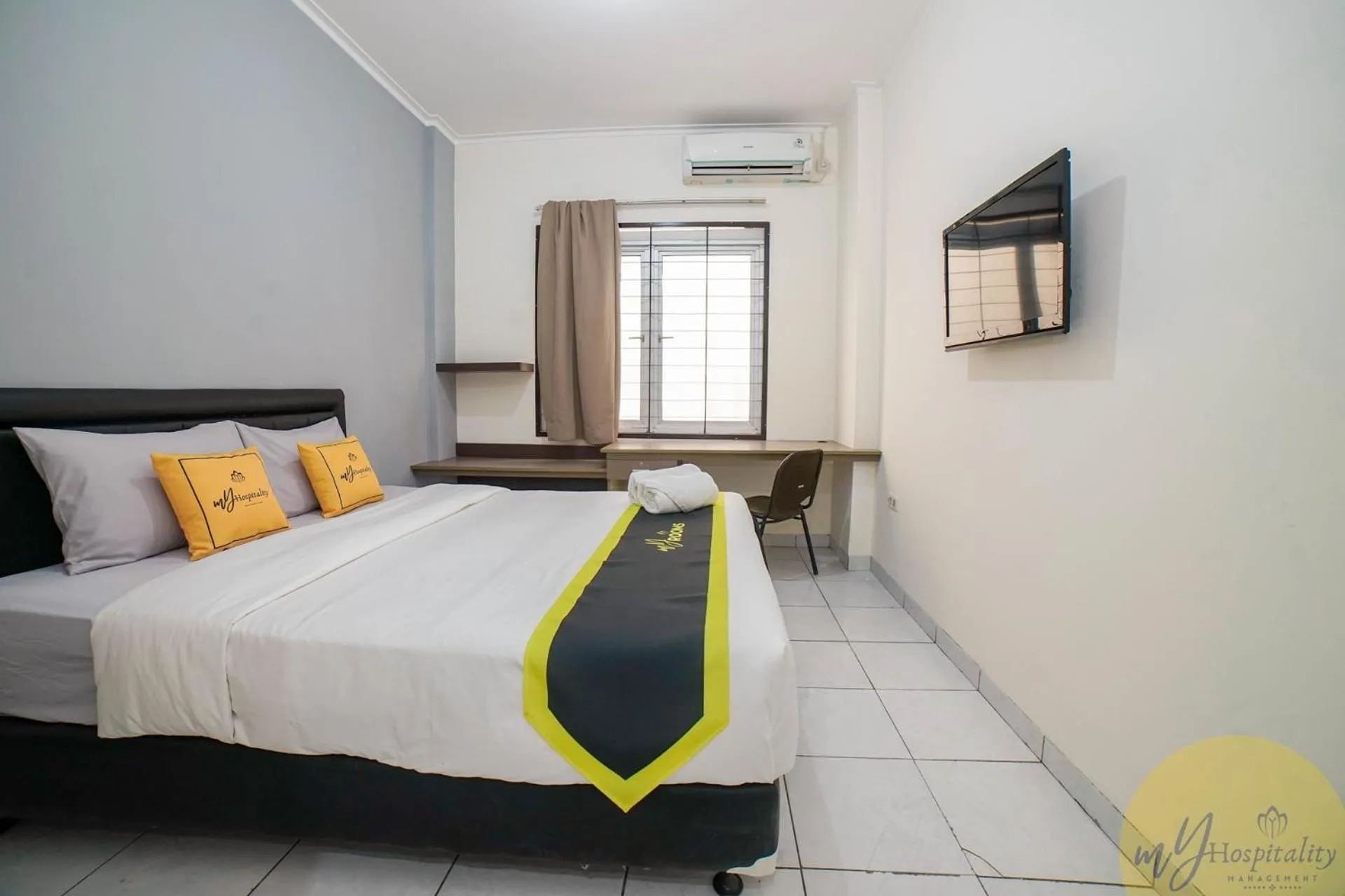 Bed in Fortuna Hotel & Residence by My Hospitality