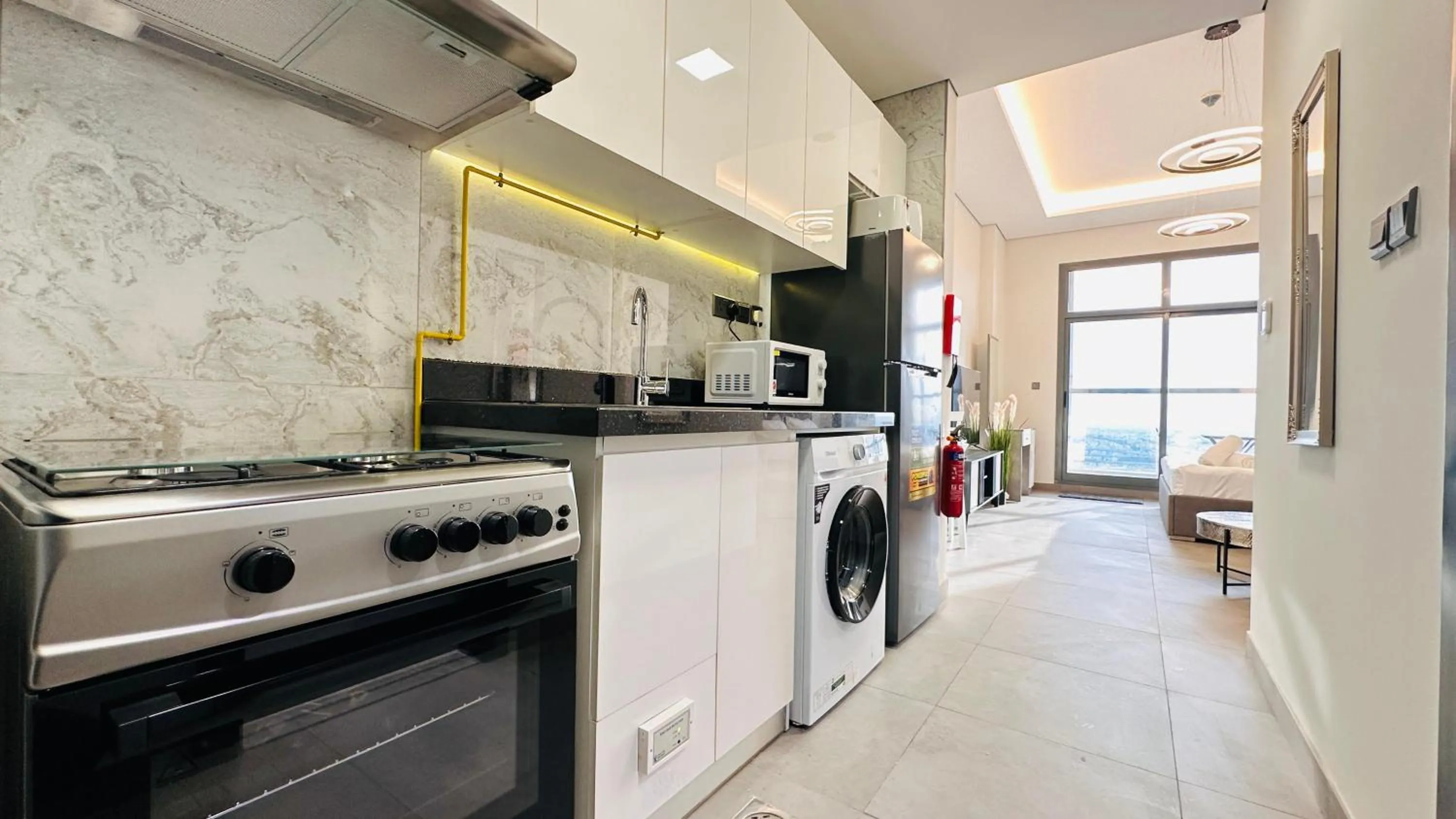 Kitchen or kitchenette in Upscale Studio Apartment Burj View with Balcony Free Parking by Belvilla
