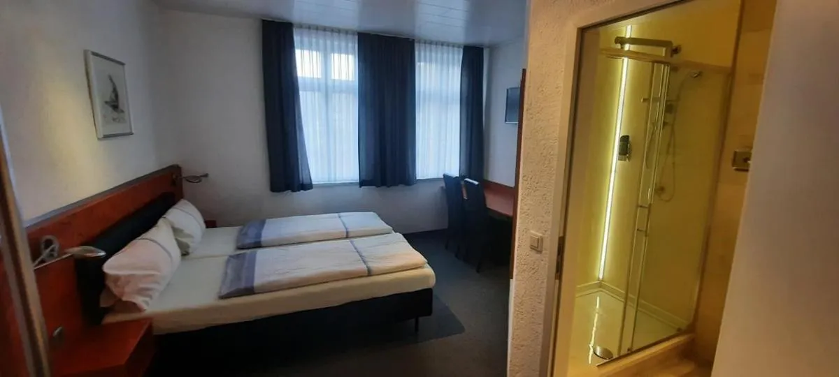 Bed in Hotel Corveyer Hof