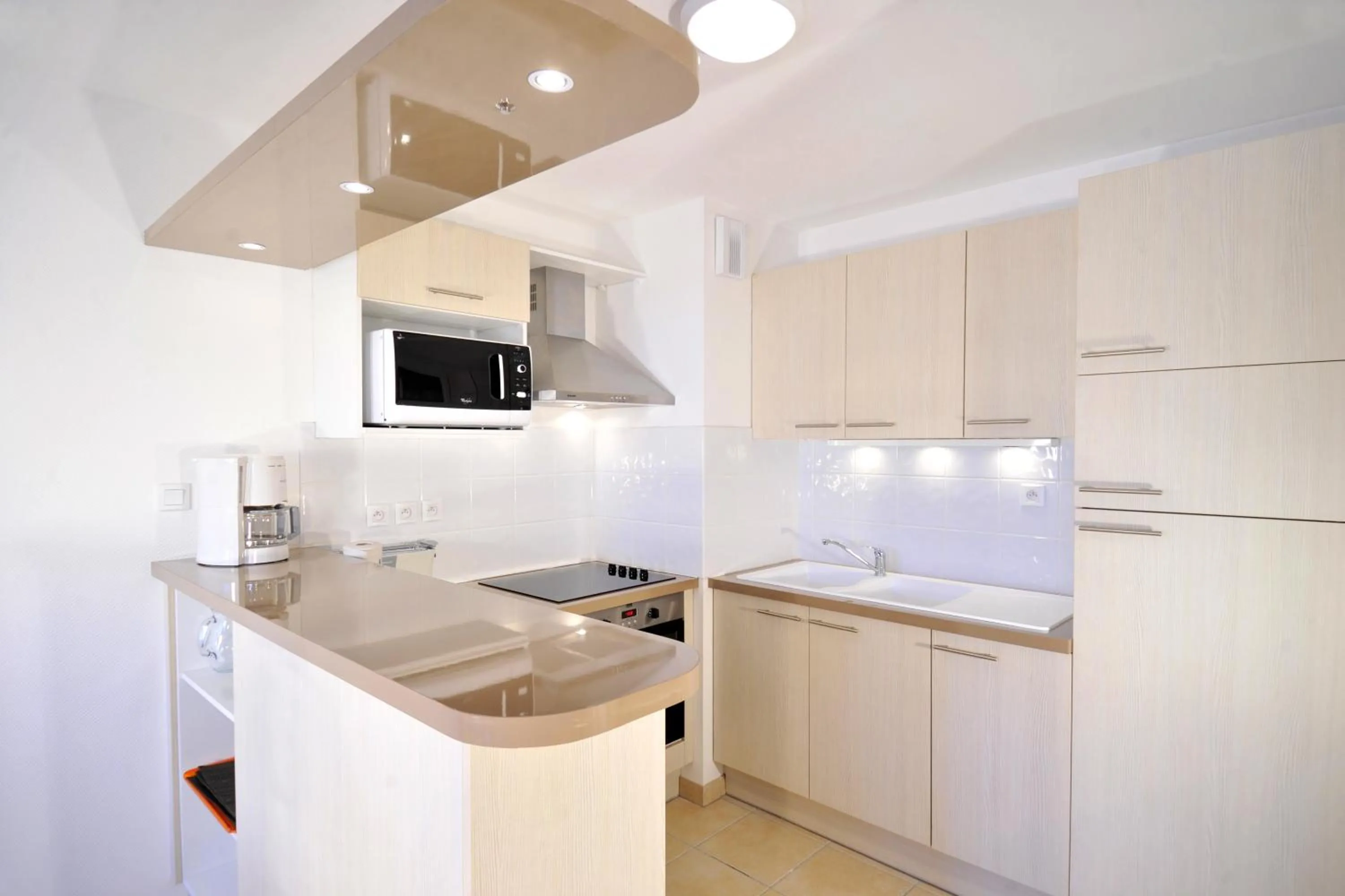 Kitchen or kitchenette in Lagrange Vacances - Résidence Jardin Mauresque