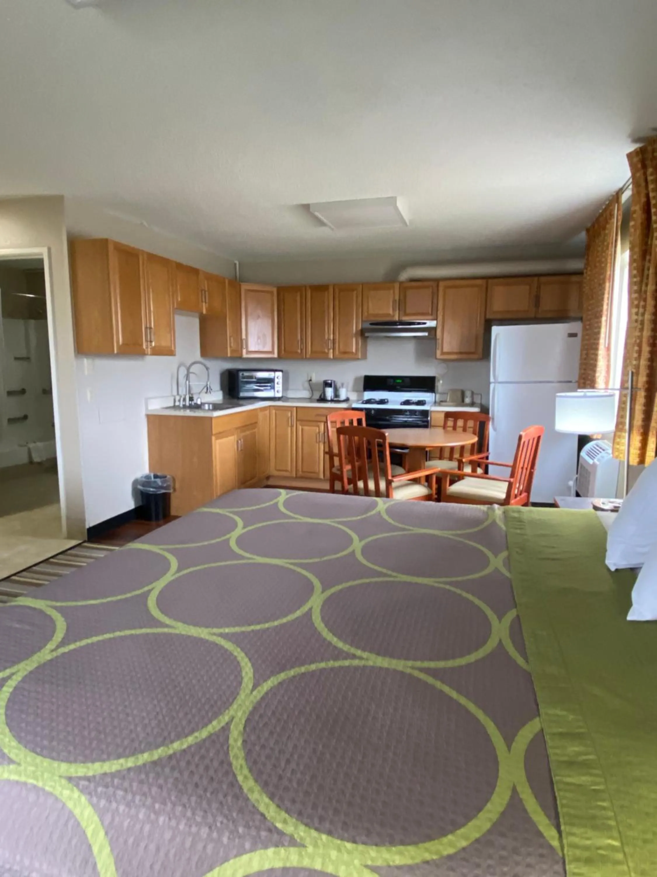 Kitchen or kitchenette in Super 8 by Wyndham Liberal KS