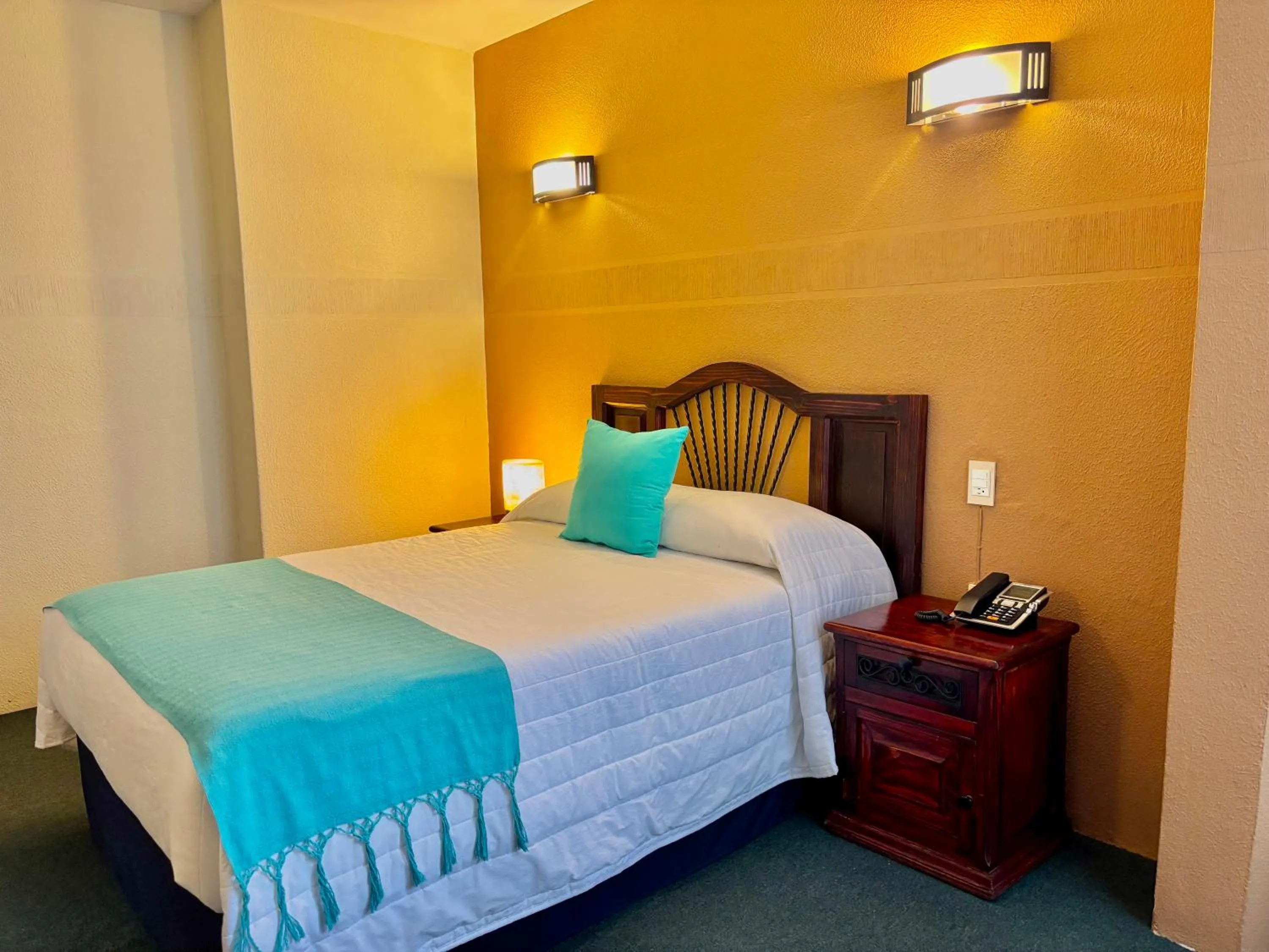 Bed in Hotel Alifer