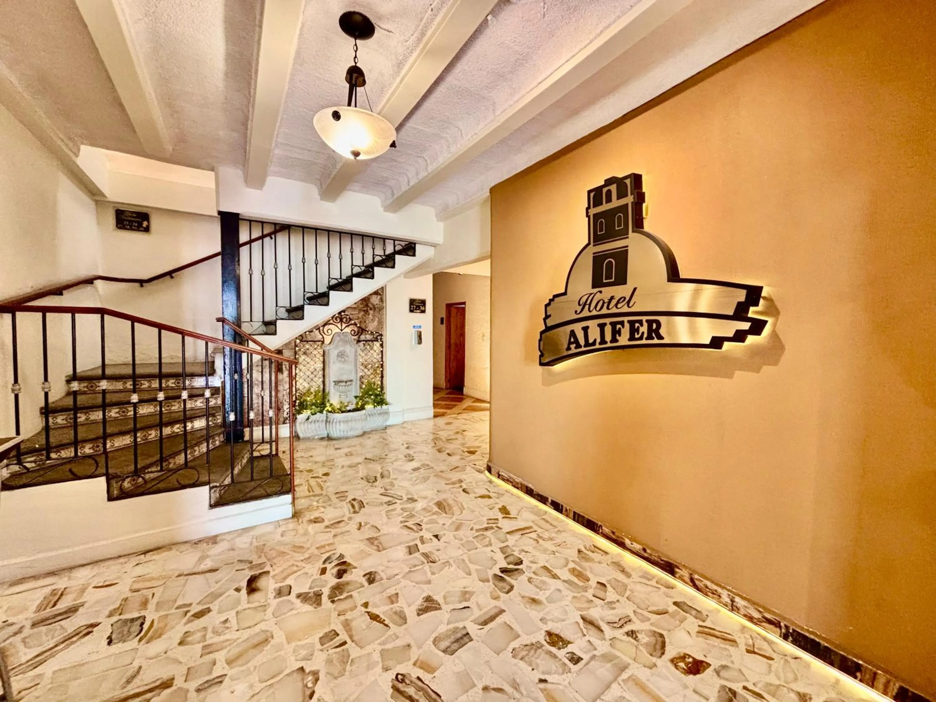 Property logo or sign in Hotel Alifer