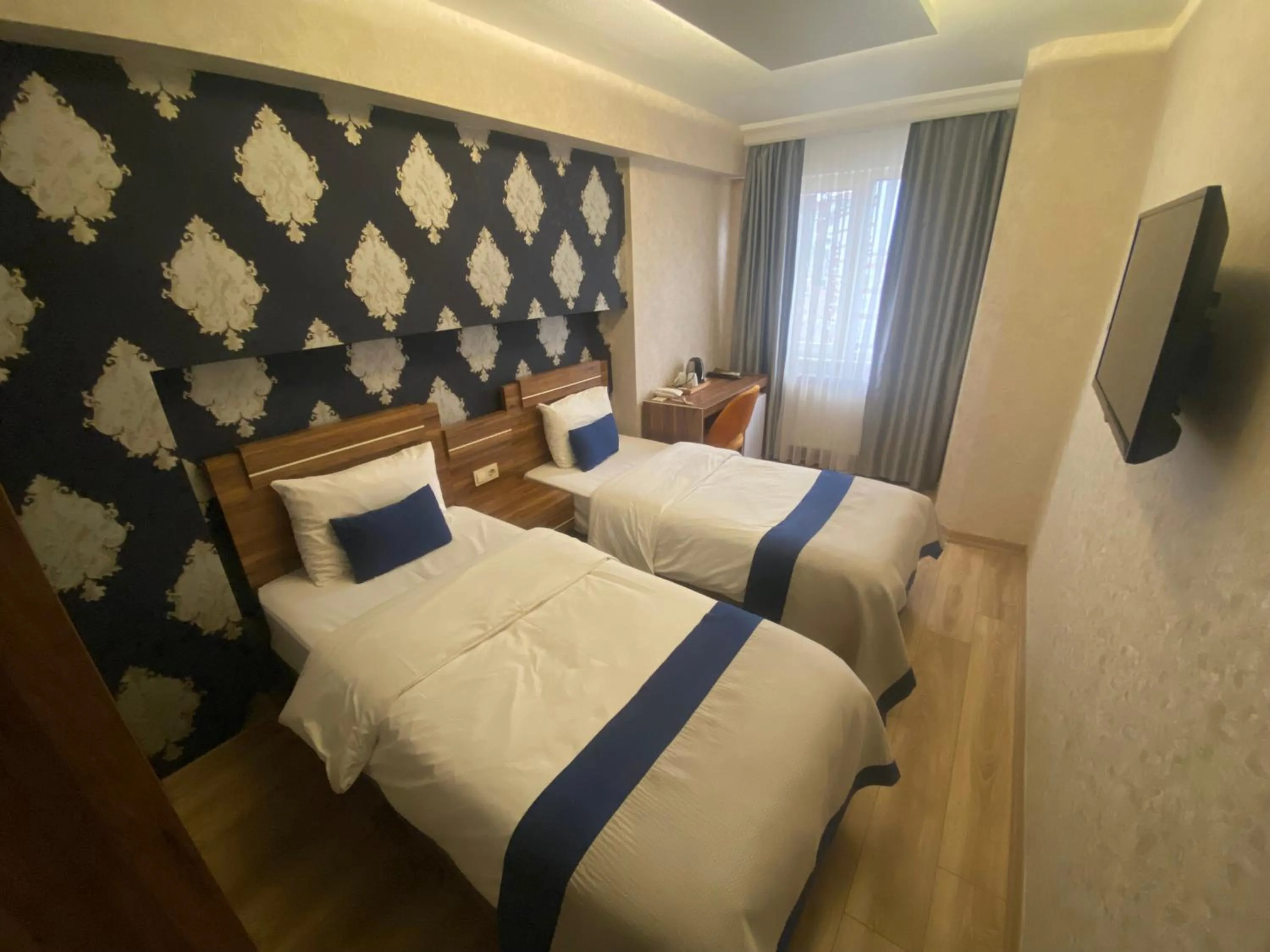 Bed in Era Palace Hotel