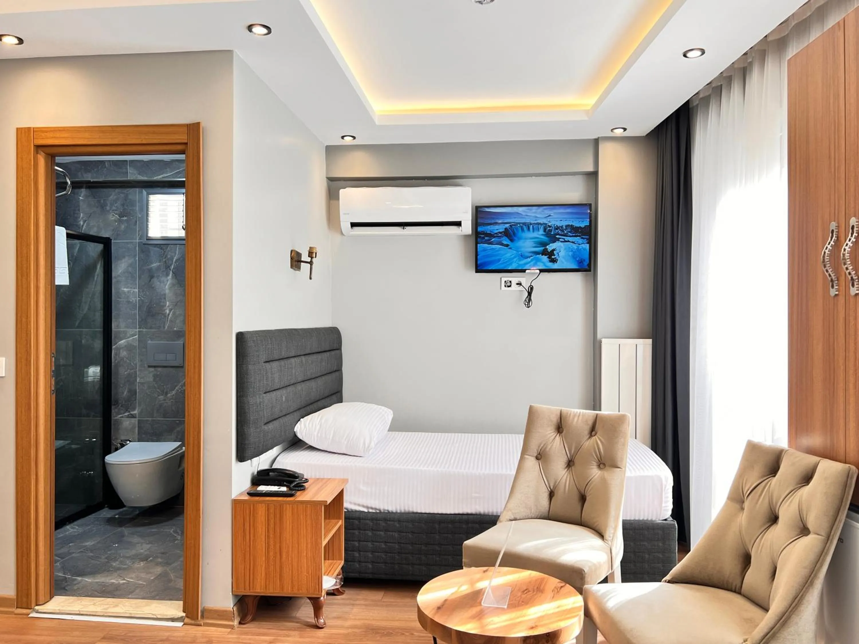 Bed in Mamma Marya Hotel