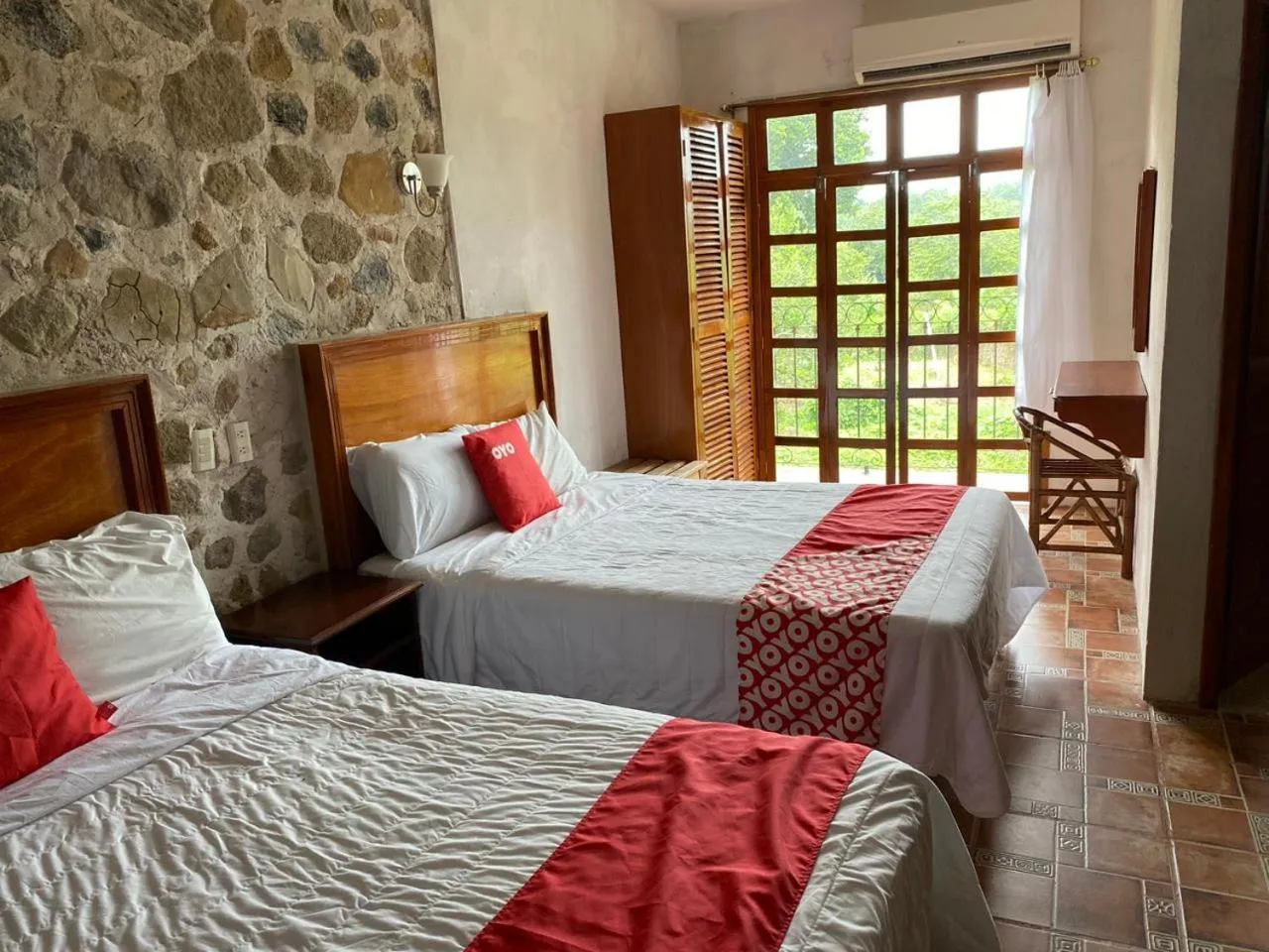 Bed in Rancho Hotel El Carmen