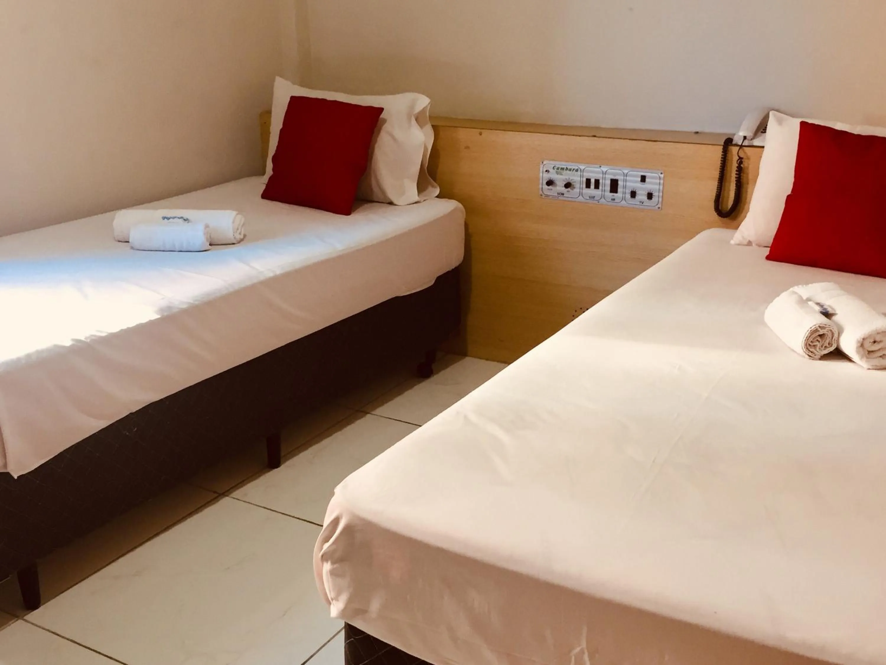 Bed in Hotel Cambará