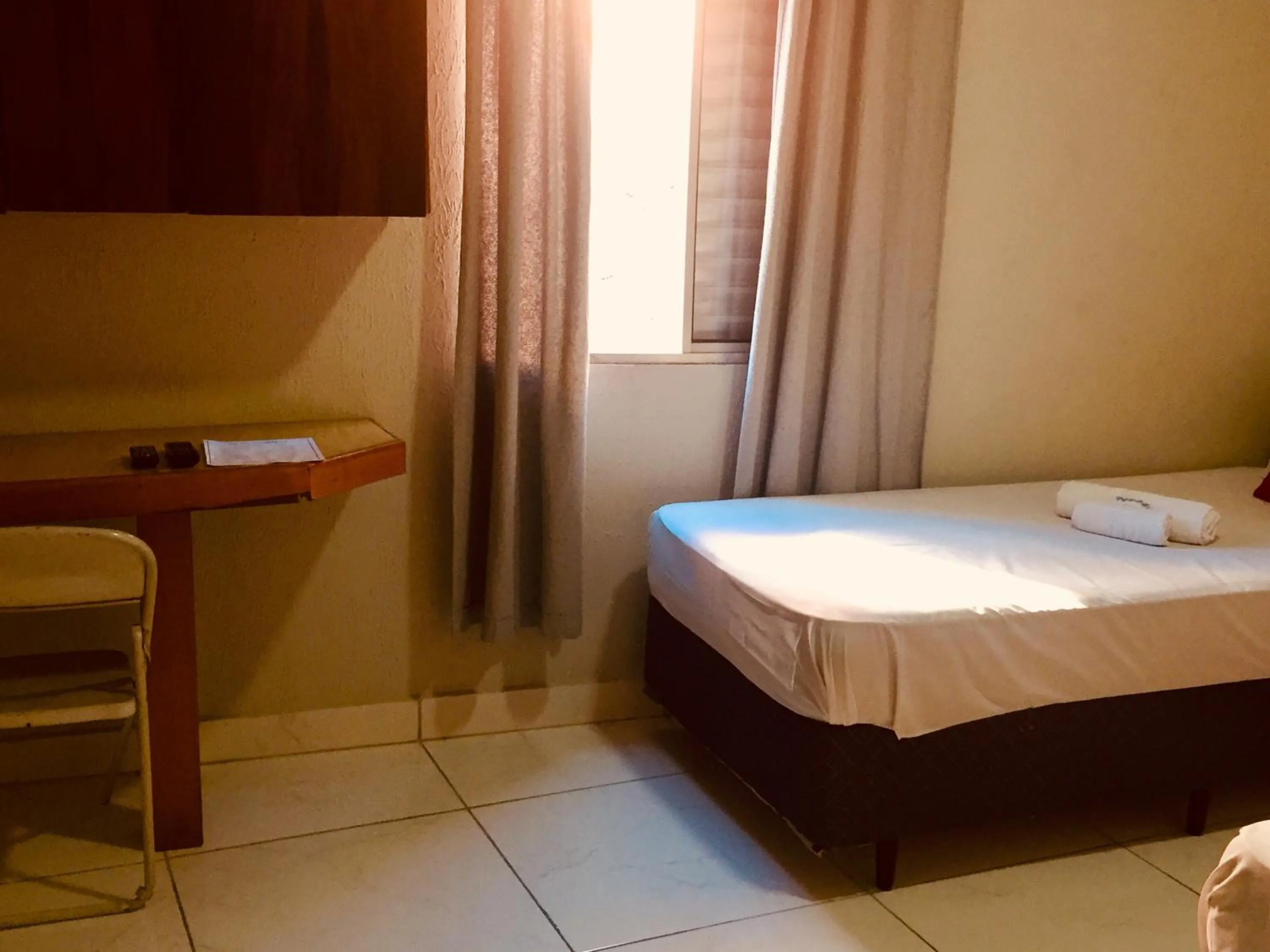 Bed in Hotel Cambará