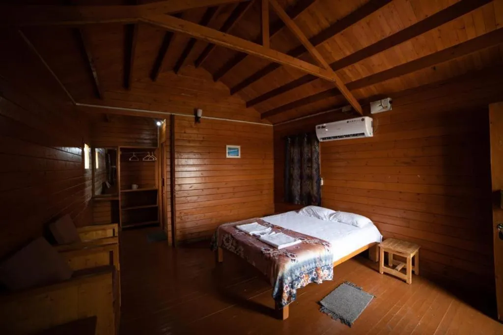 Bed in Leo wooden resorts