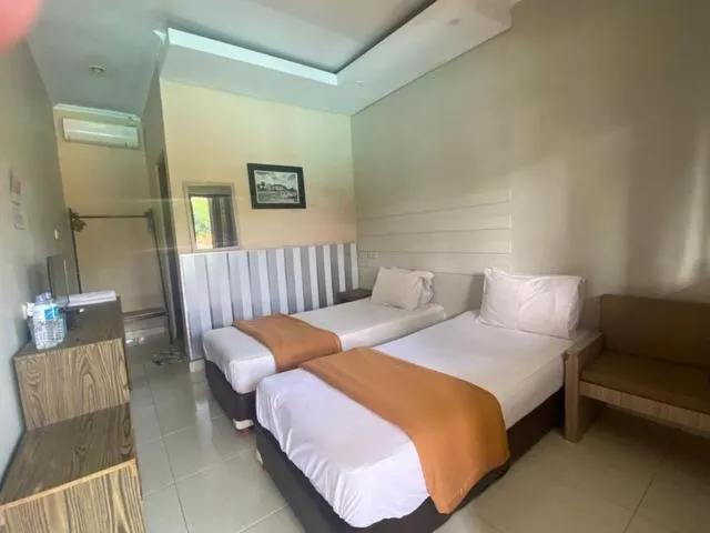 Bed in Roemah kita hotel