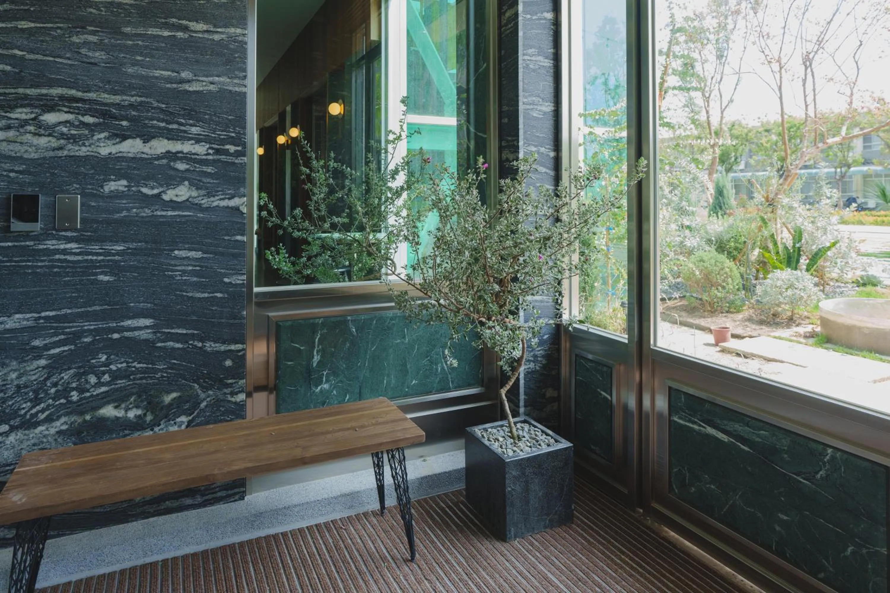 Facade/entrance in PAPO'A Harbor Hotel