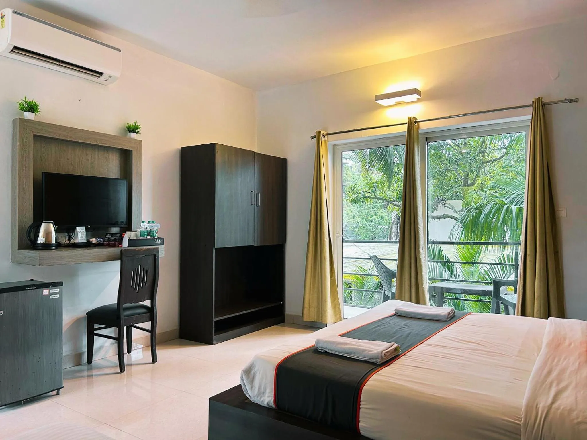 Bed in Bay Breeze Resorts & Hotels