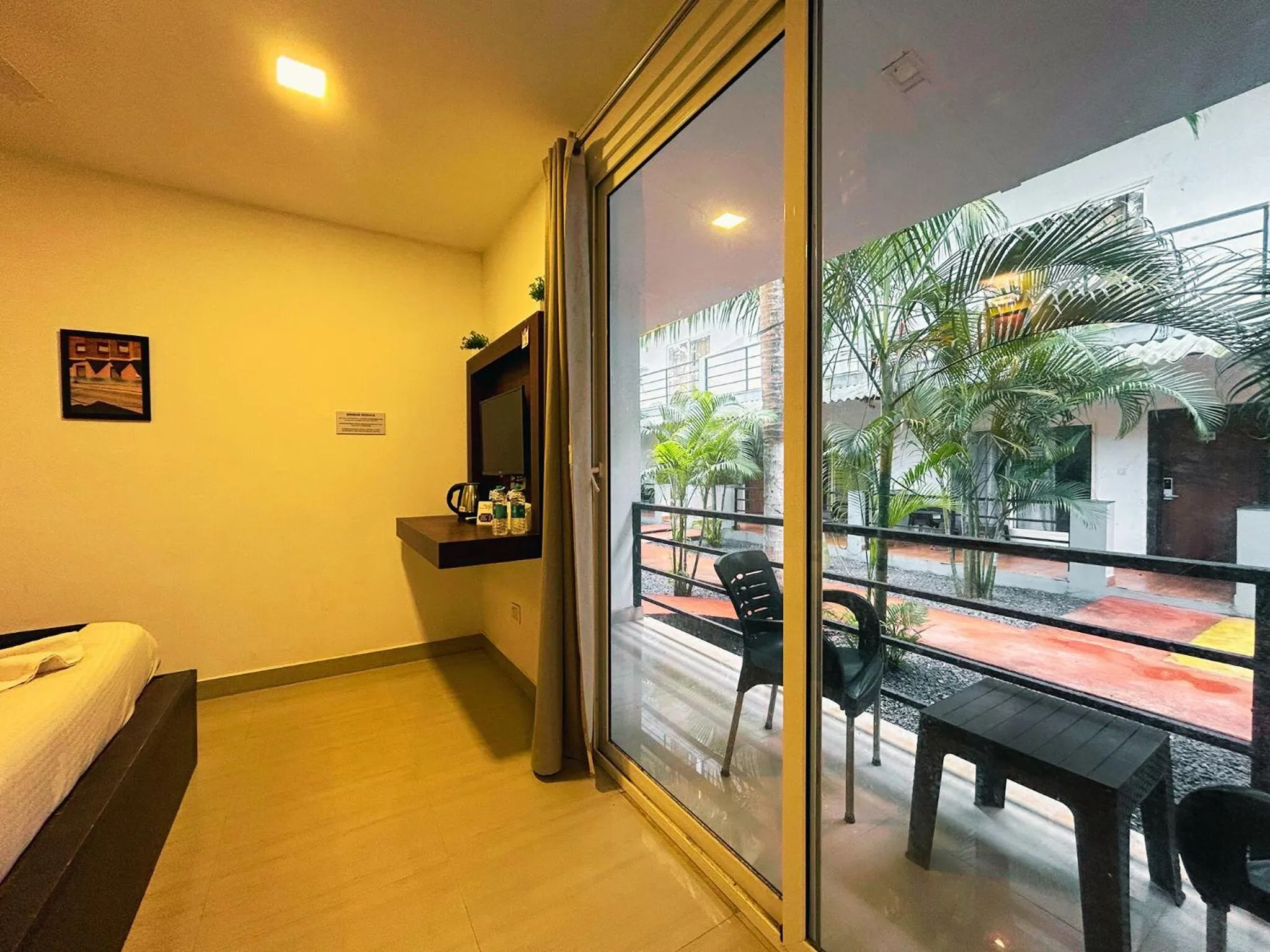 Bed in Bay Breeze Resorts & Hotels