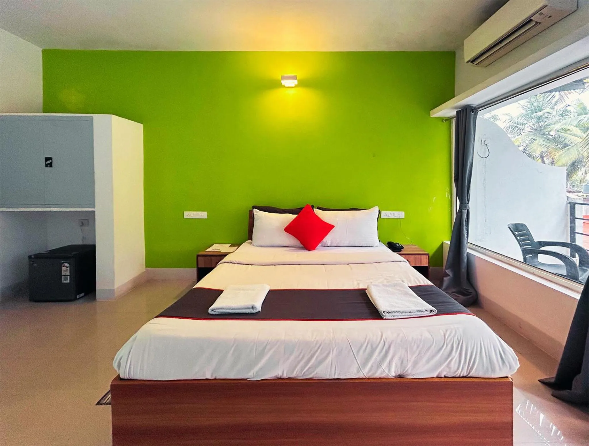 Bed in Bay Breeze Resorts & Hotels