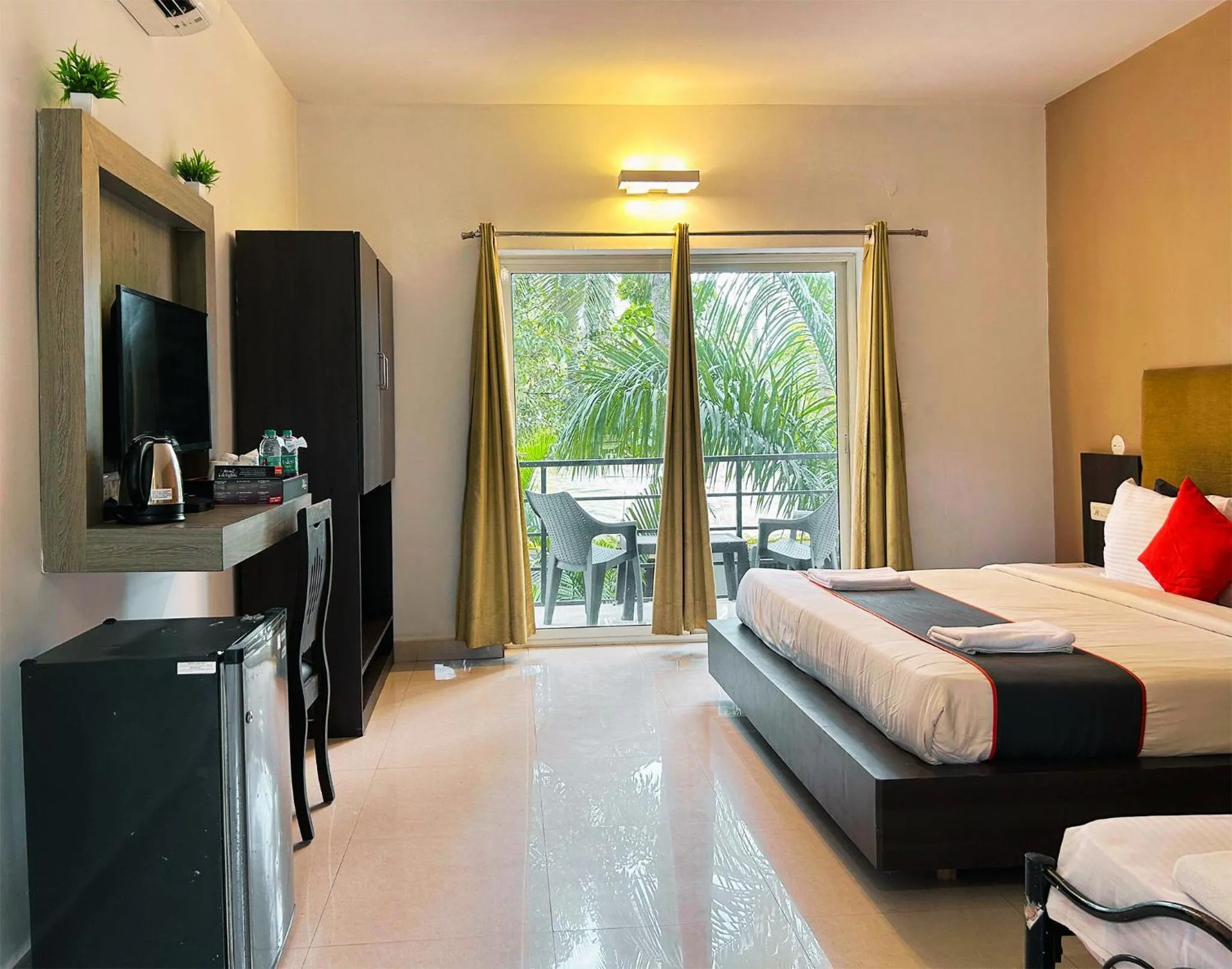 Bed in Bay Breeze Resorts & Hotels