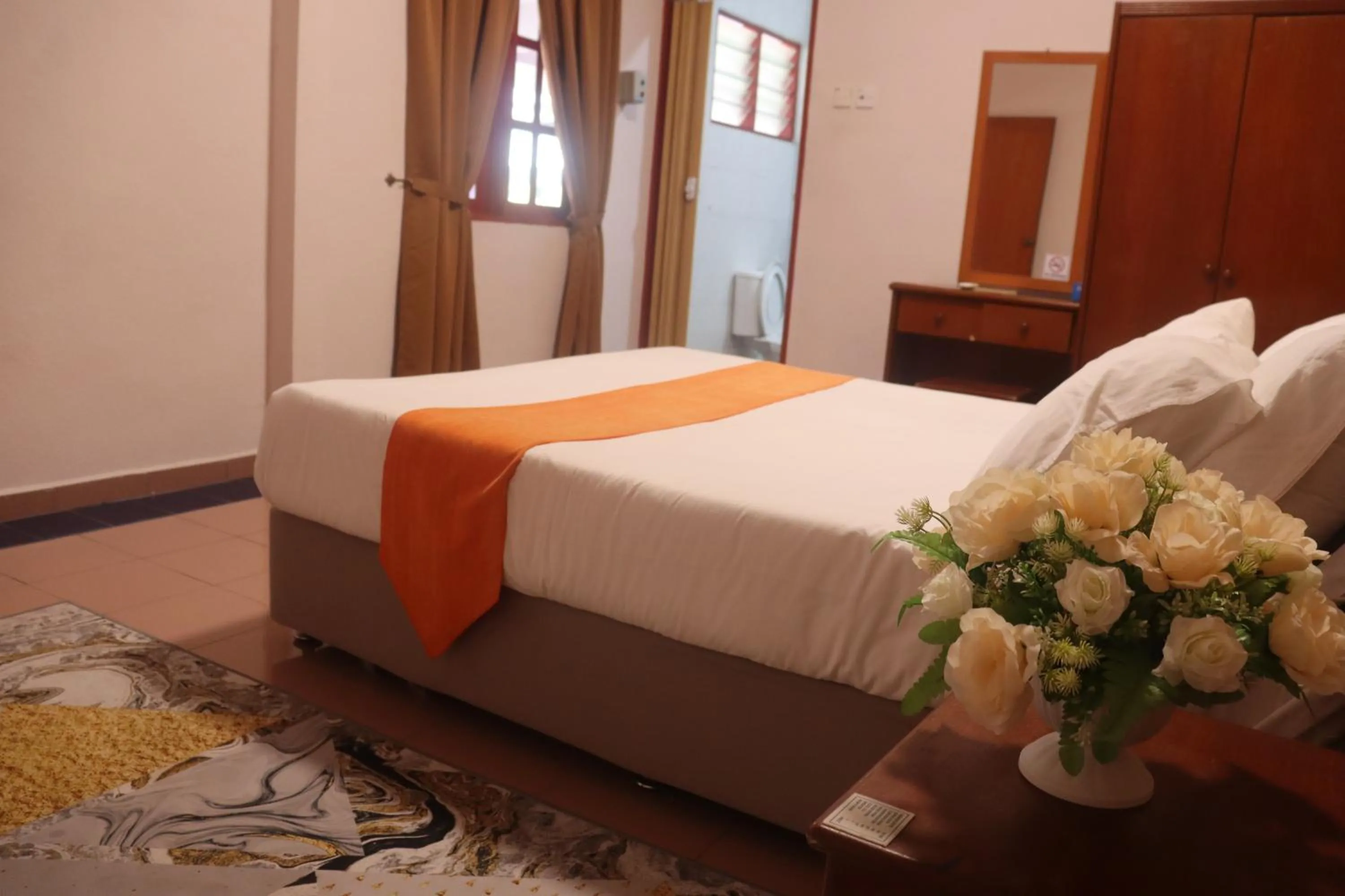 Photo of the whole room, Bed in Bunga Raya Resort Parit Buntar