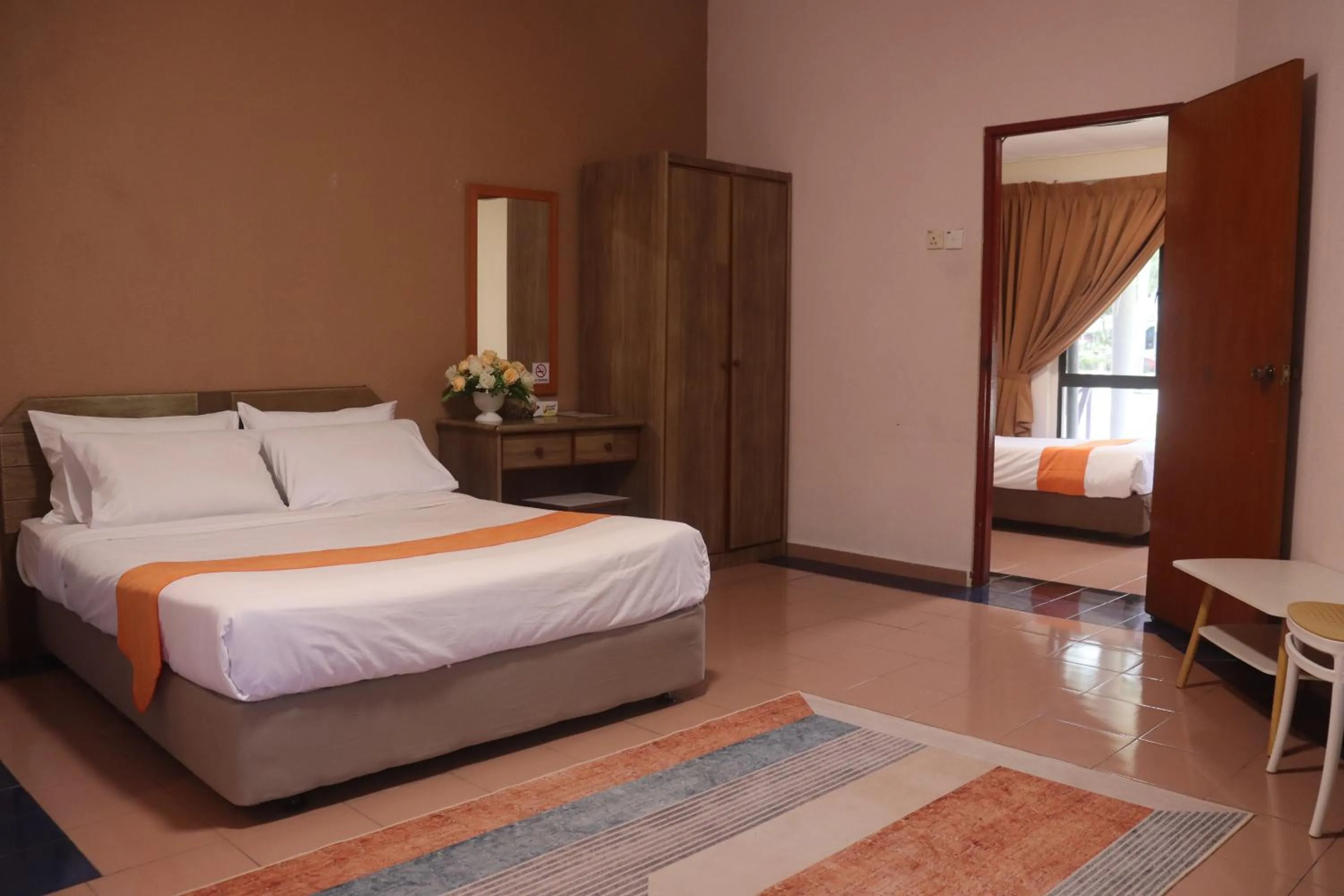 Photo of the whole room, Bed in Bunga Raya Resort Parit Buntar