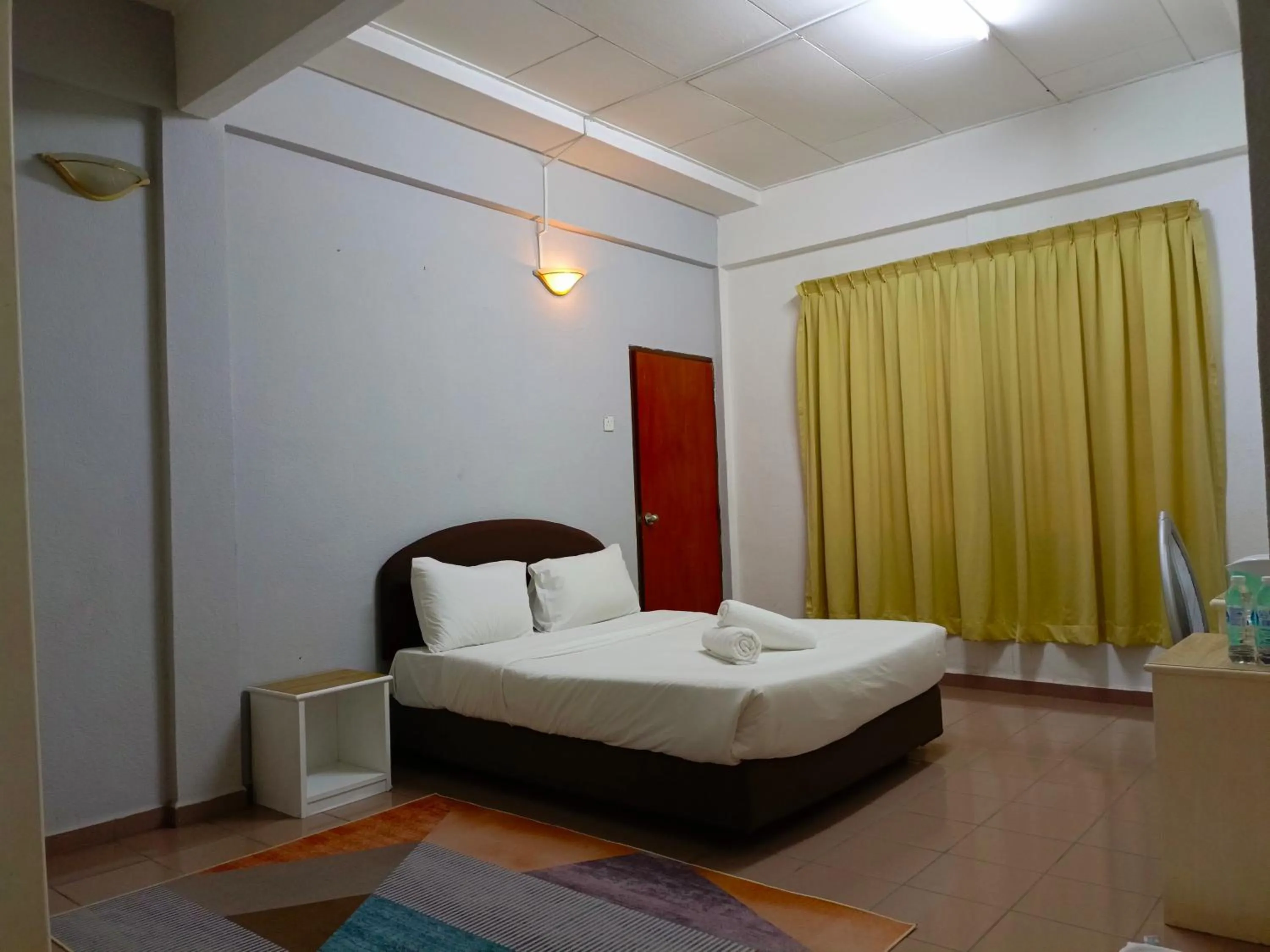 Photo of the whole room, Bed in Bunga Raya Resort Parit Buntar