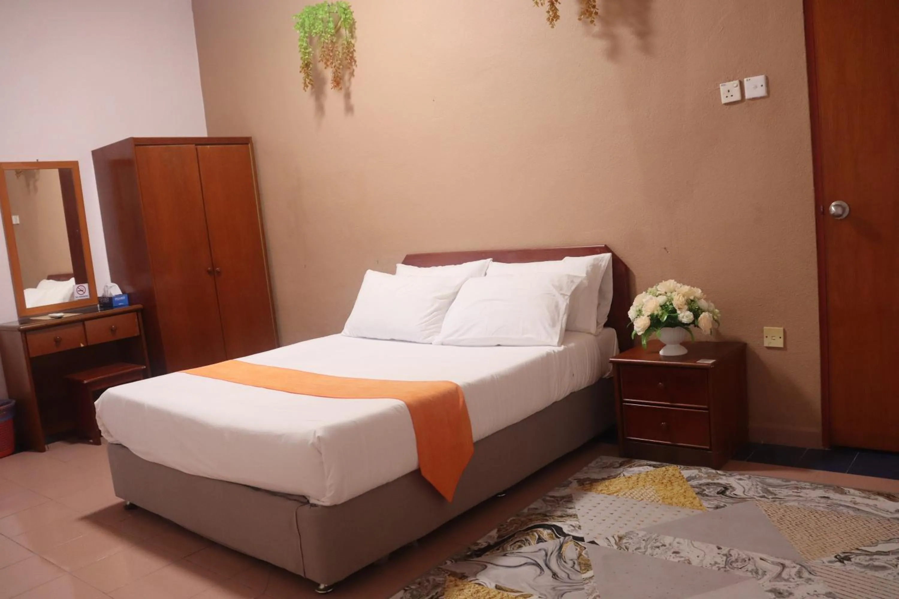 Photo of the whole room, Bed in Bunga Raya Resort Parit Buntar