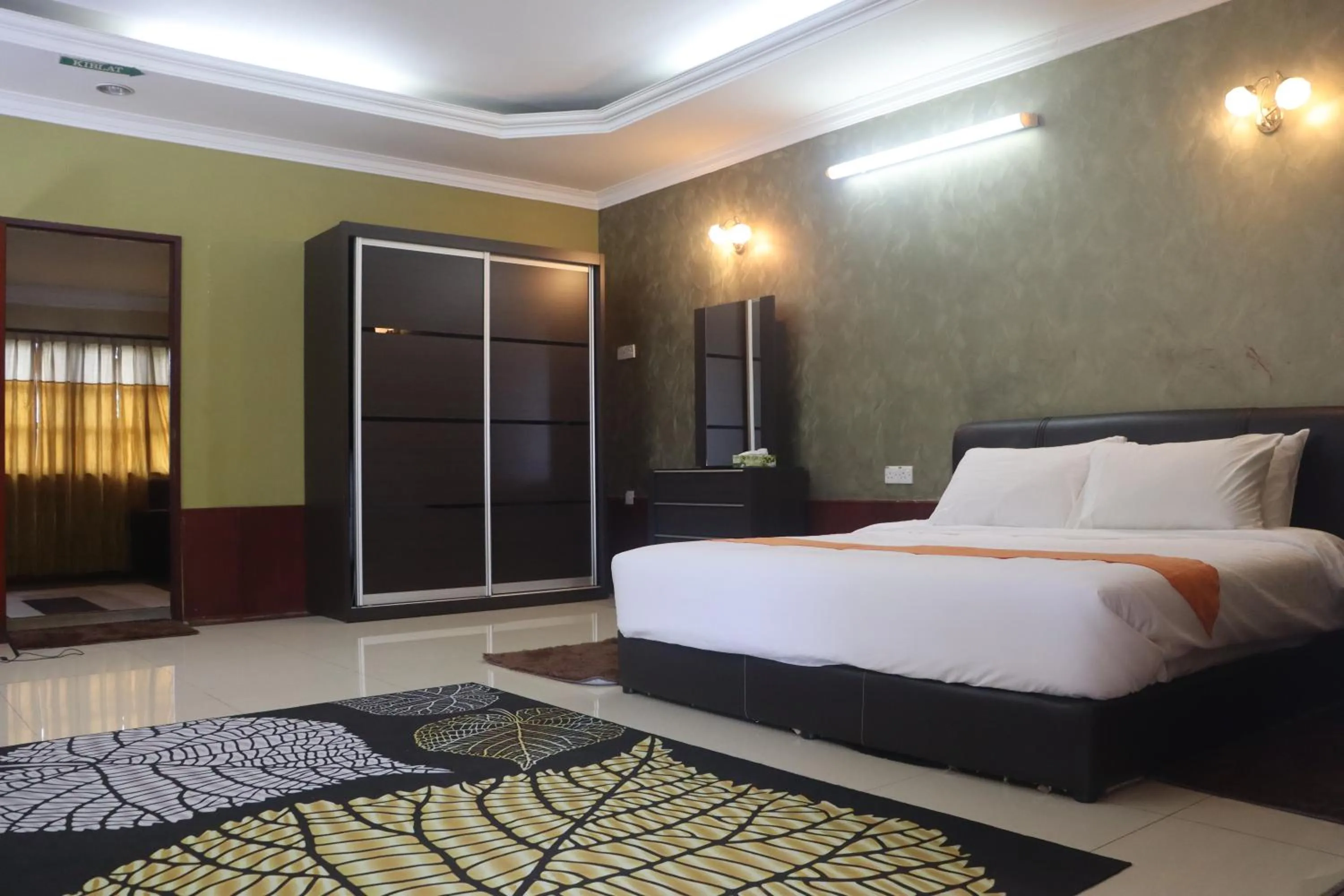 Photo of the whole room, Bed in Bunga Raya Resort Parit Buntar