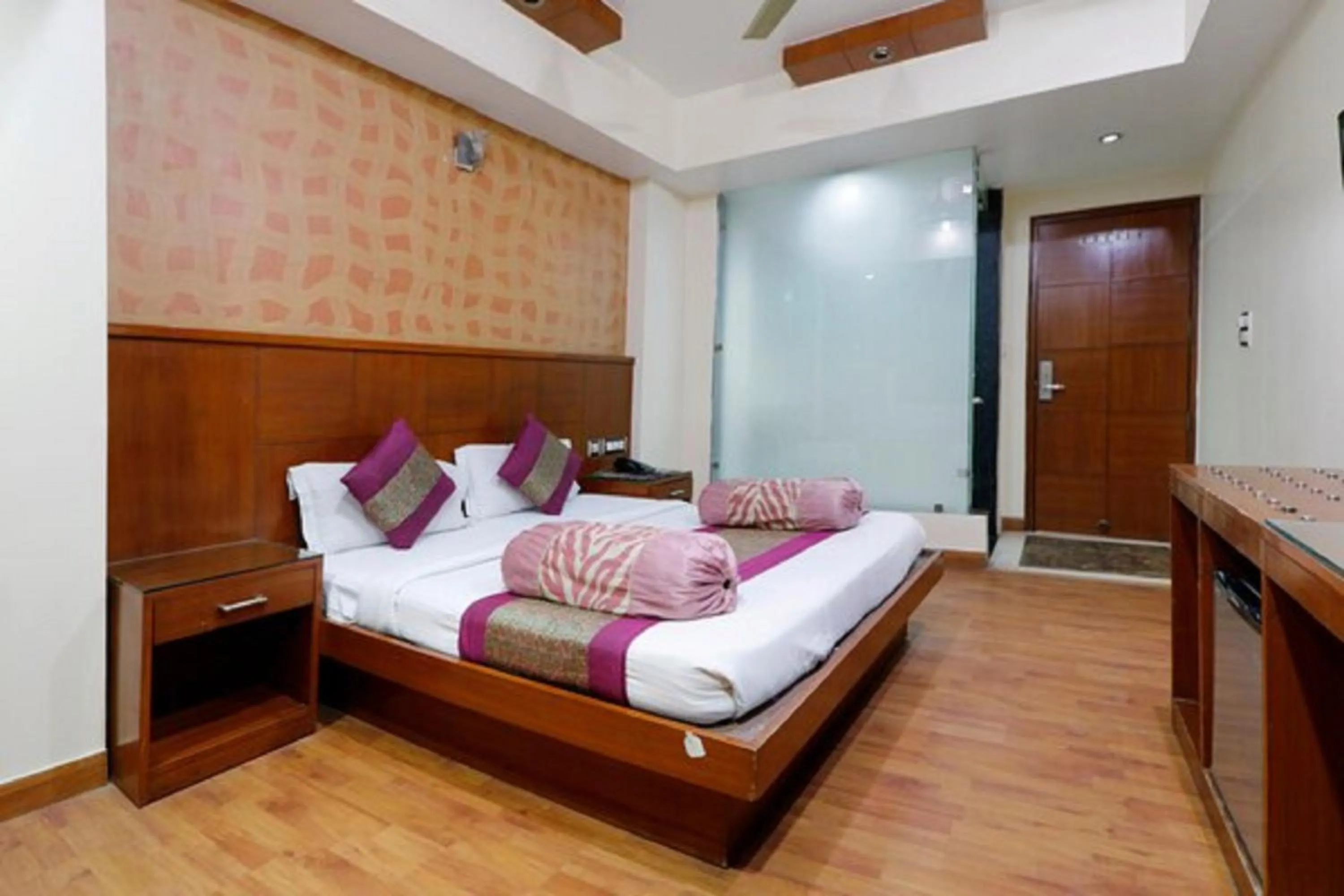 Bed in Hotel Shivdev International