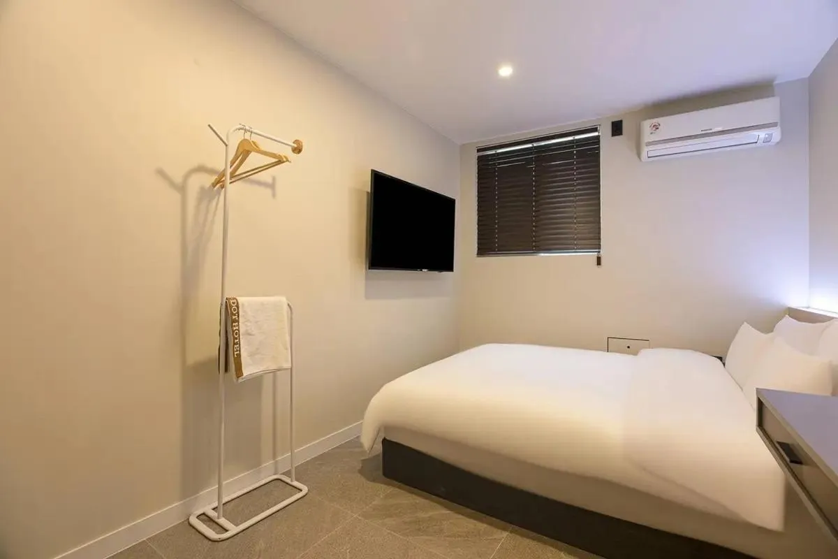 Bed in Brown Dot Hotel Suwon Jeongja Branch