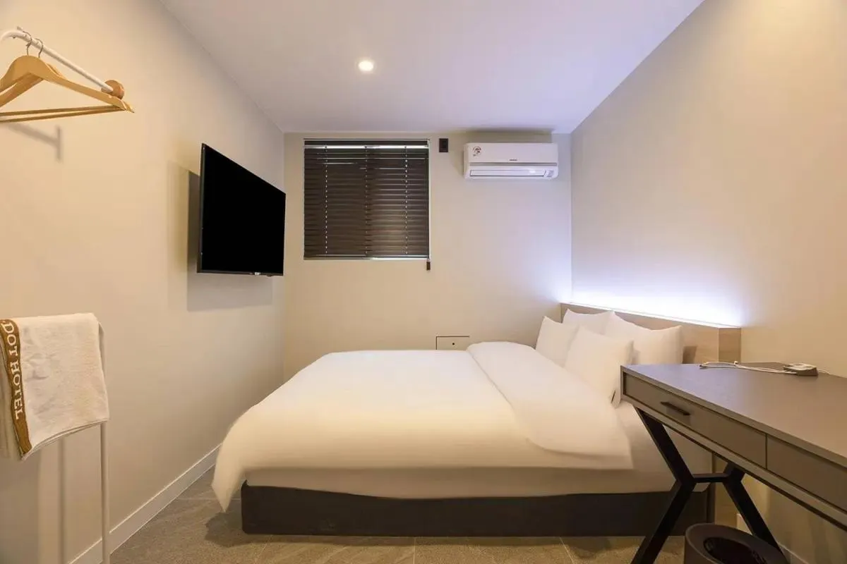 Bed in Brown Dot Hotel Suwon Jeongja Branch