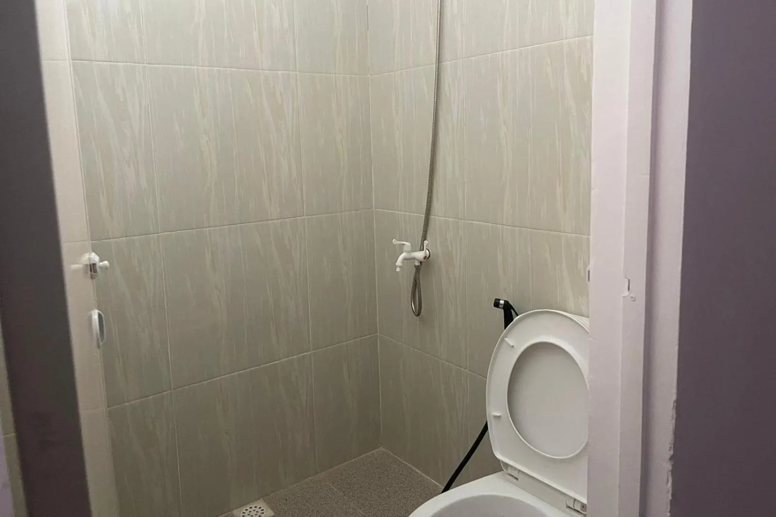 Bathroom in Hotel O Kng Homestay Syariah