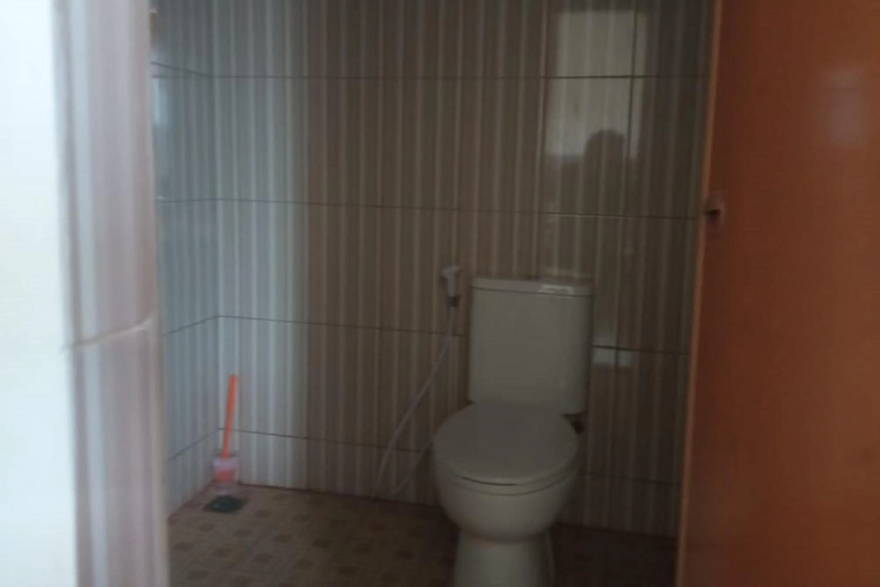 Bathroom in Hotel O Njy House SyariahNearBandara Sultan Syarif Kasim II