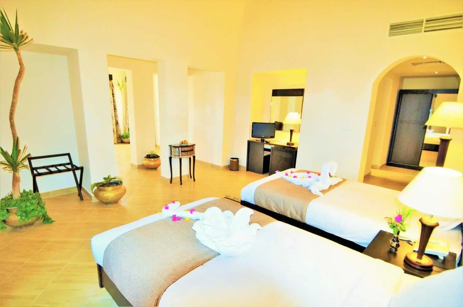 Bed in Rohanou Beach Resort Bed in Rohanou Beach Resort