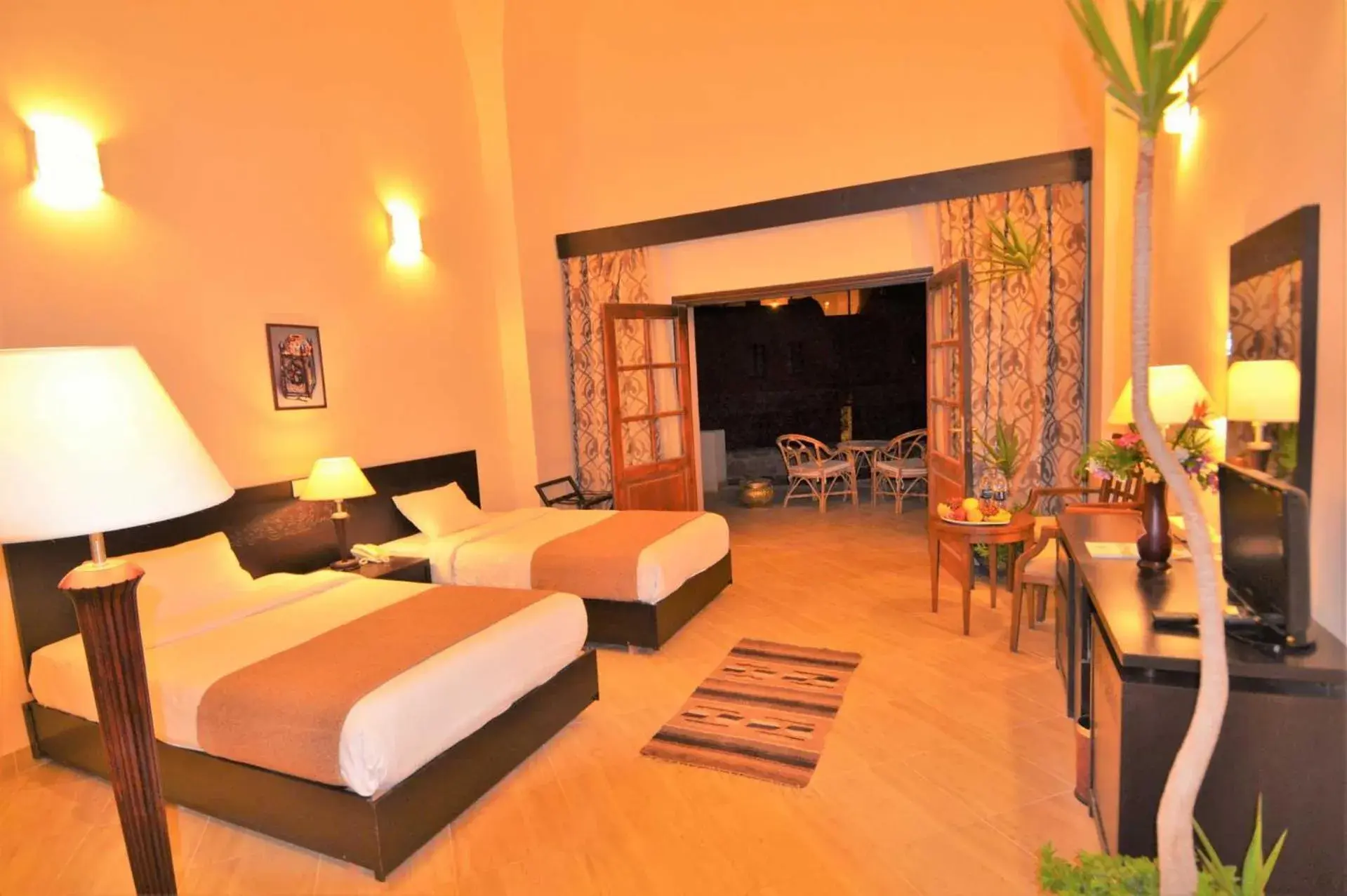 Bed in Rohanou Beach Resort Bed in Rohanou Beach Resort