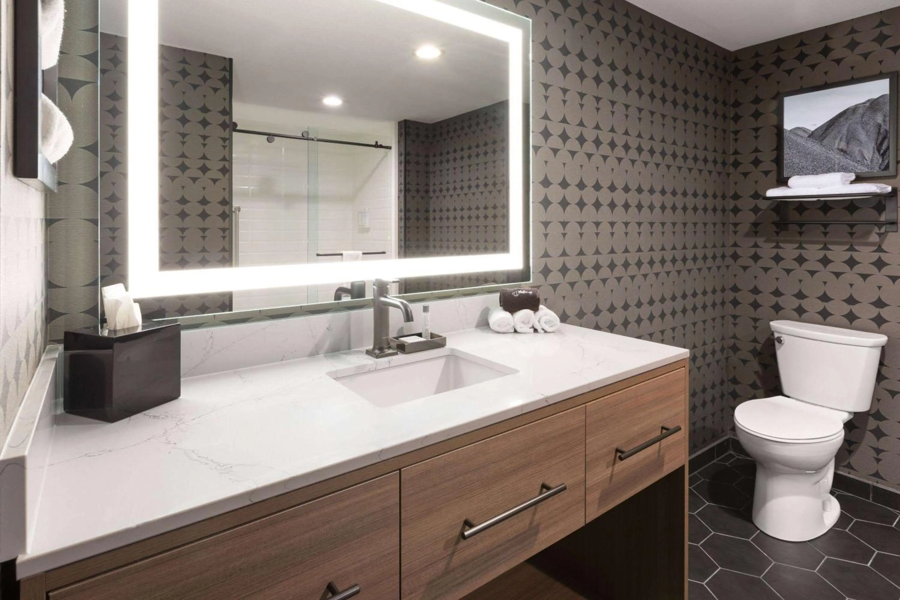Bathroom in Riverbend Hotel and Suites, Trademark Collection by Wyndham