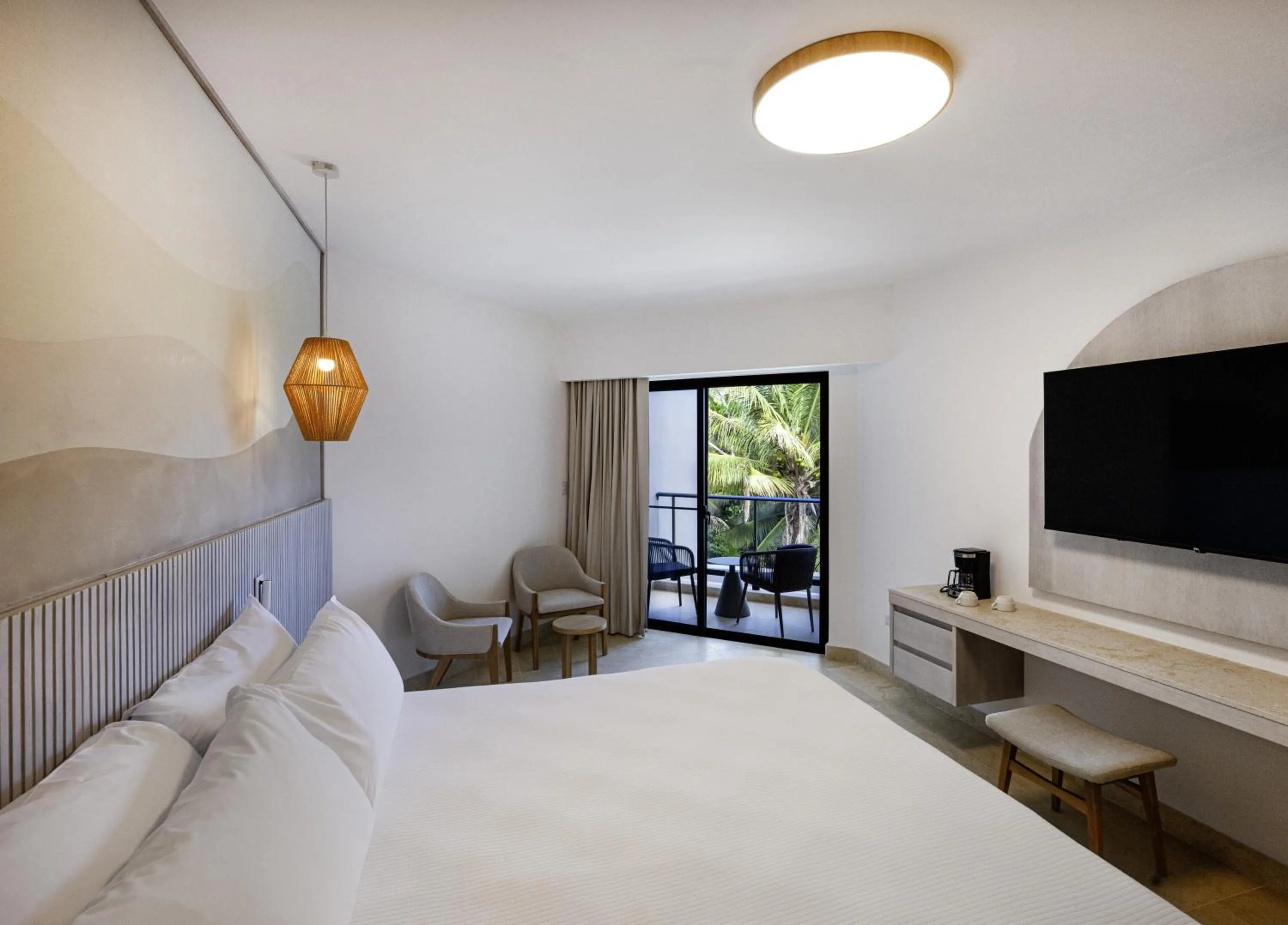 Bed in Viva Miches by Wyndham, a Trademark All Inclusive Resort