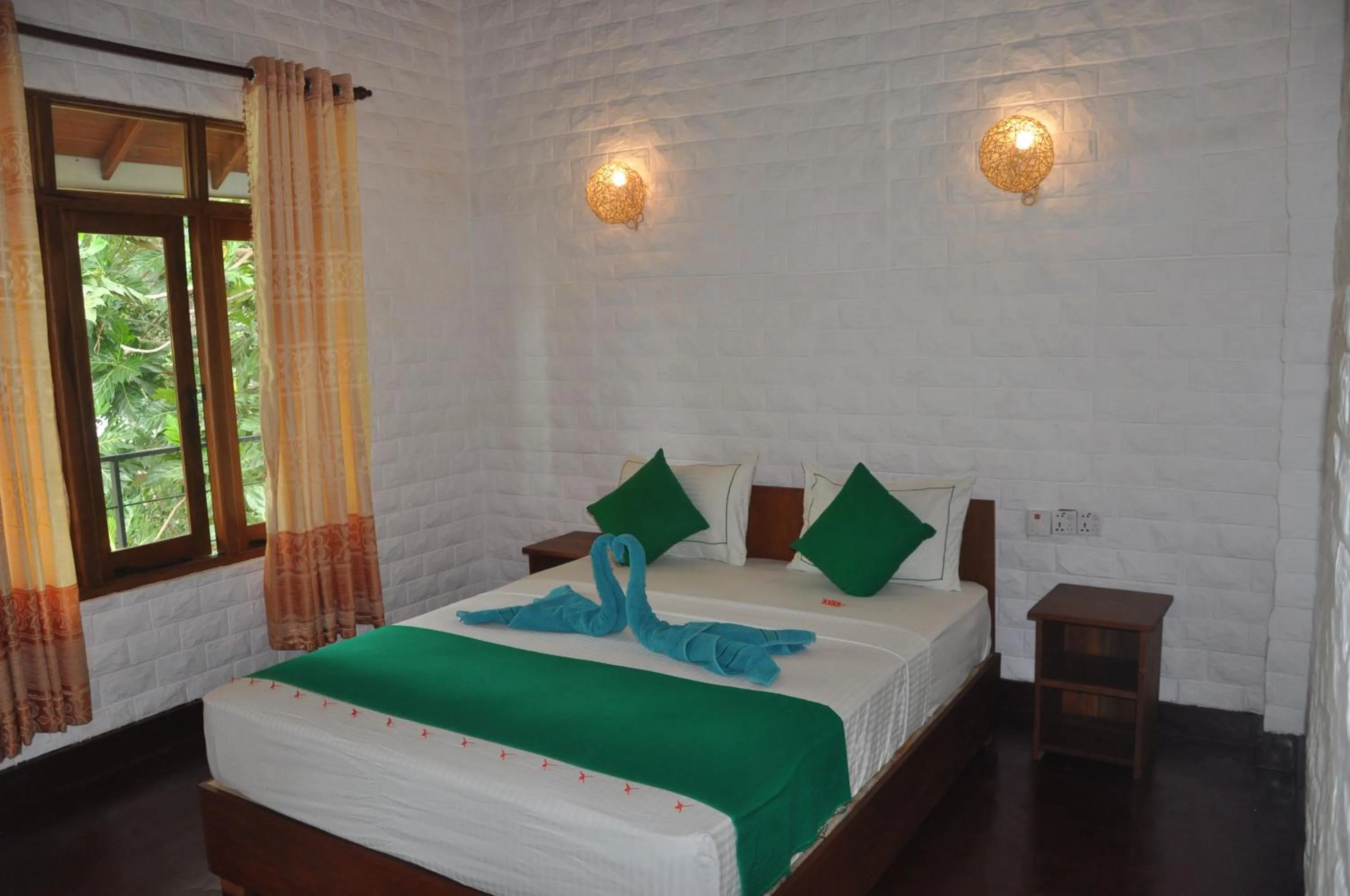 Bed in Liyon Rest sigiriya
