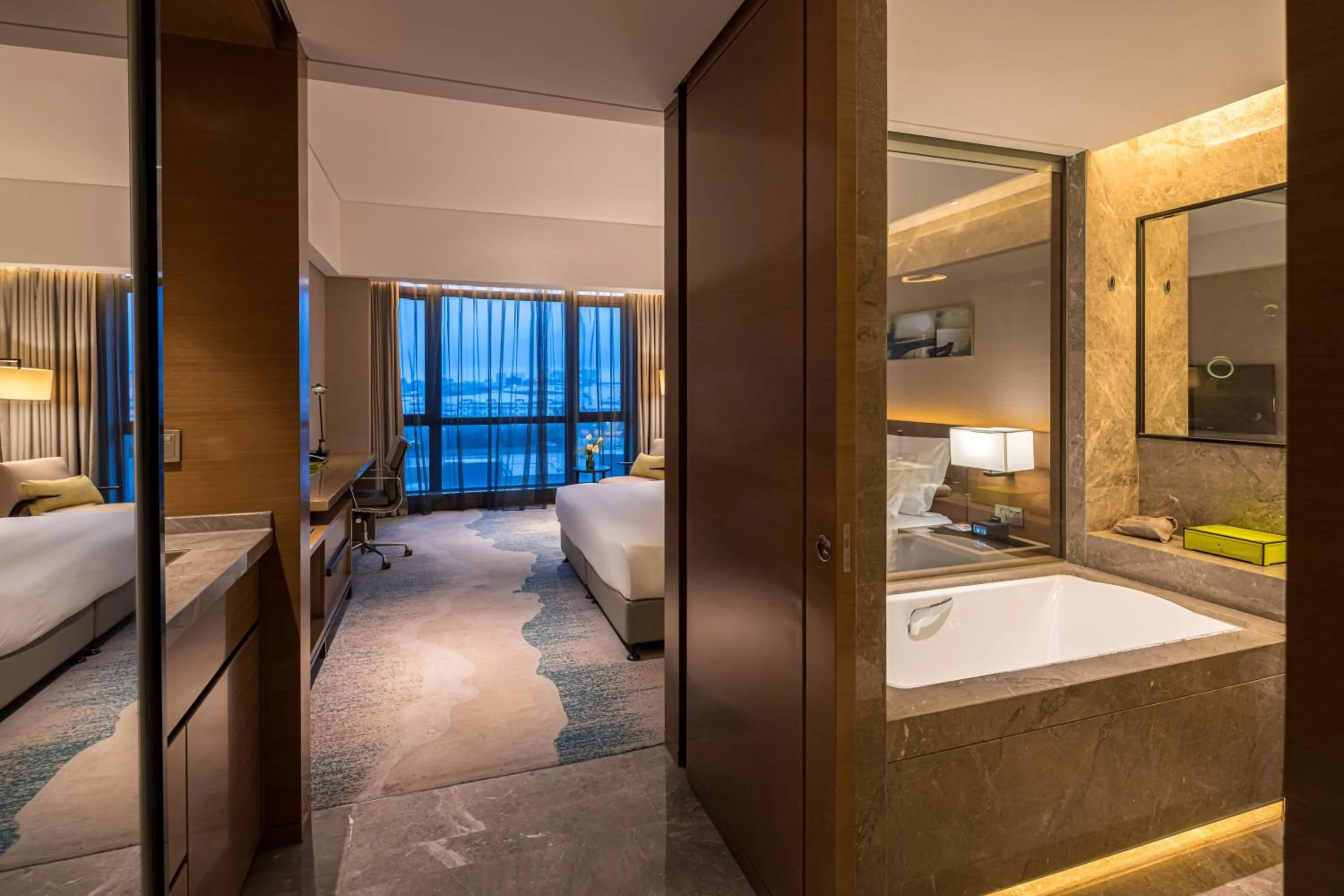 Bed in Wyndham JinJiang Hotel