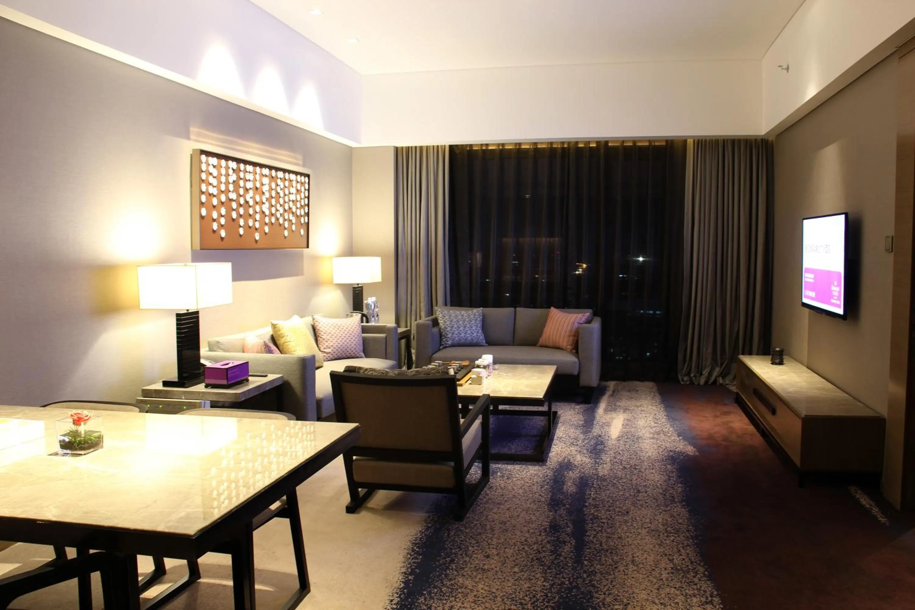 Living room in Wyndham JinJiang Hotel