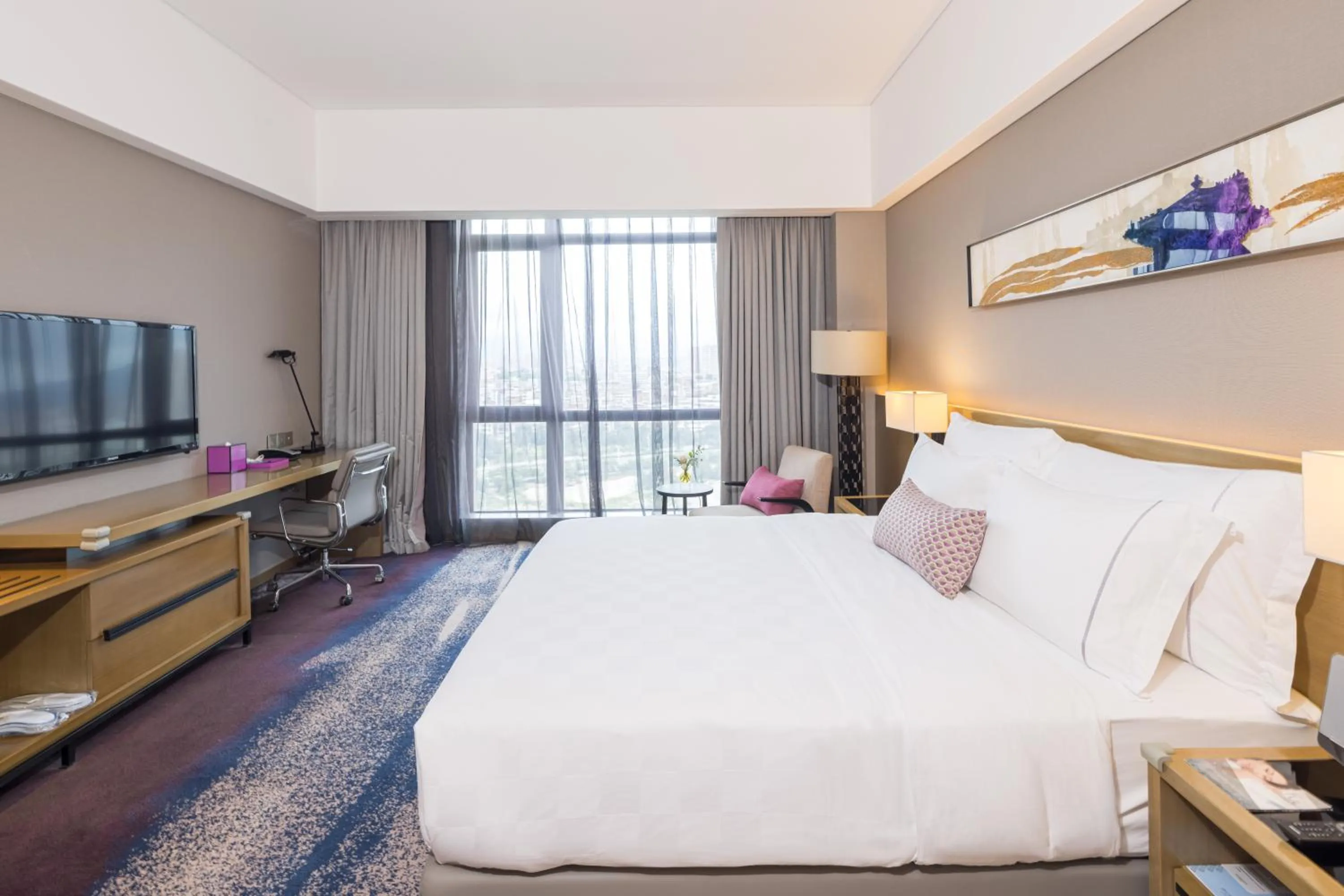 Bed in Wyndham JinJiang Hotel