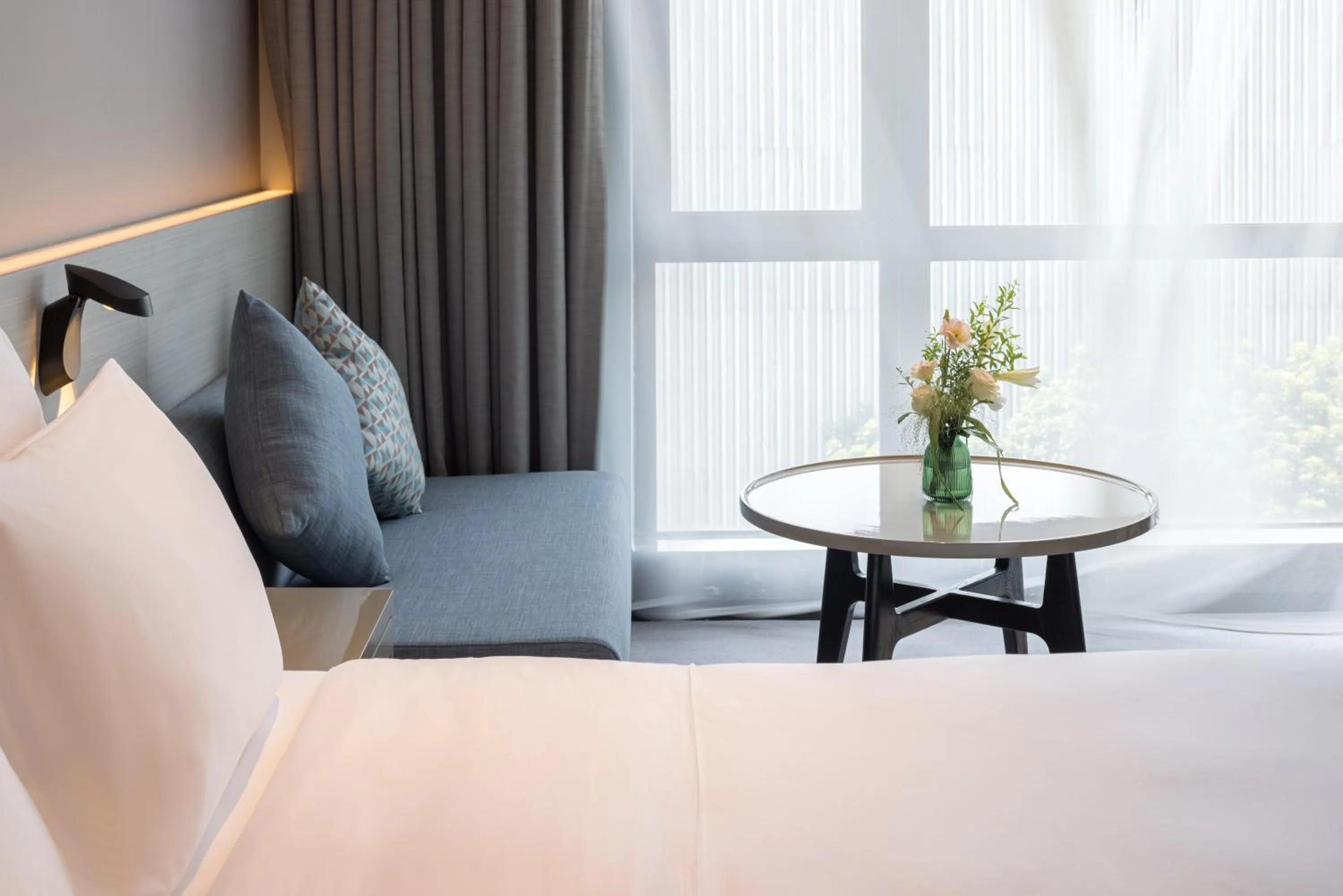 Bed in Wyndham JinJiang Hotel