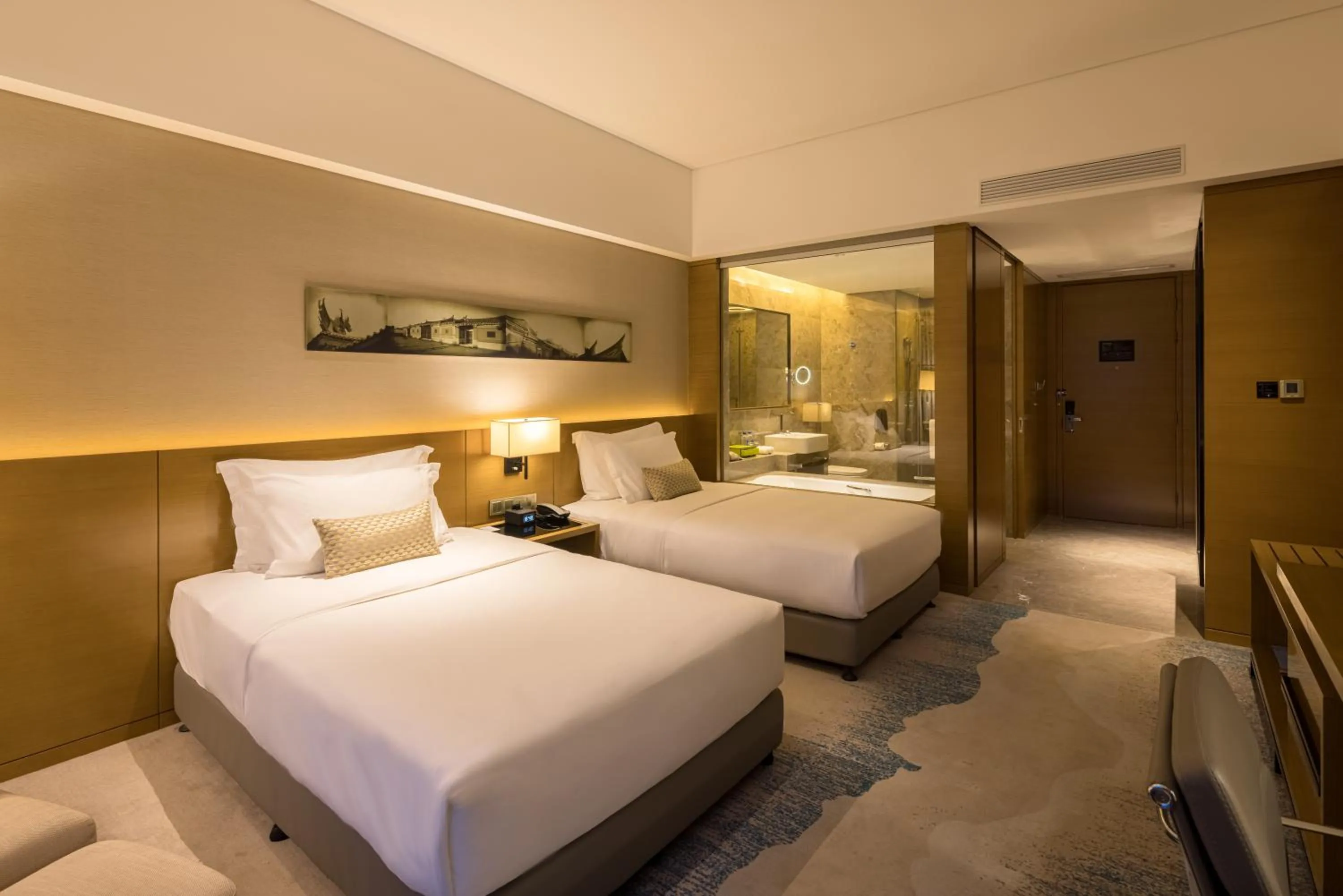 Bed in Wyndham JinJiang Hotel