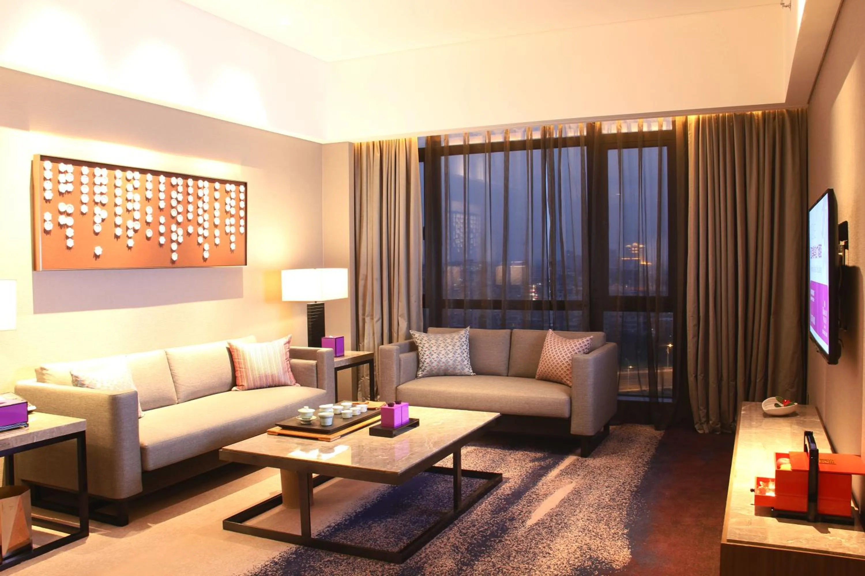 Living room in Wyndham JinJiang Hotel