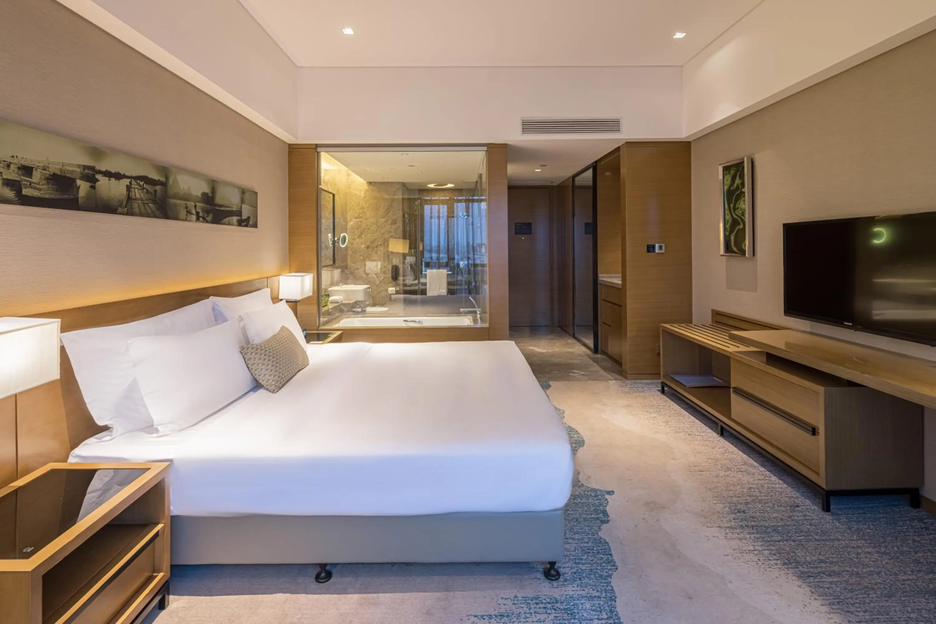 Bed in Wyndham JinJiang Hotel