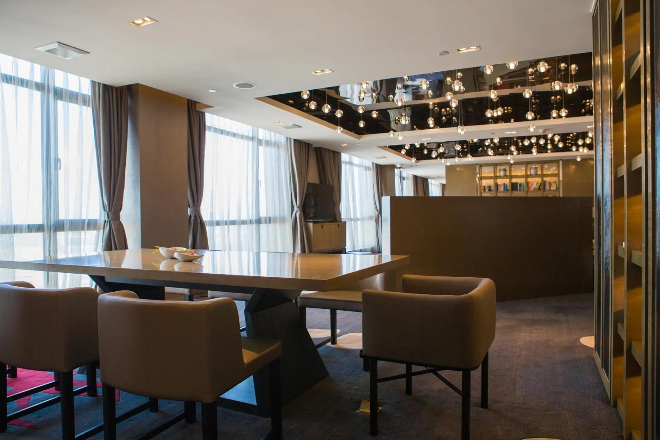 Communal lounge/ TV room in Wyndham JinJiang Hotel