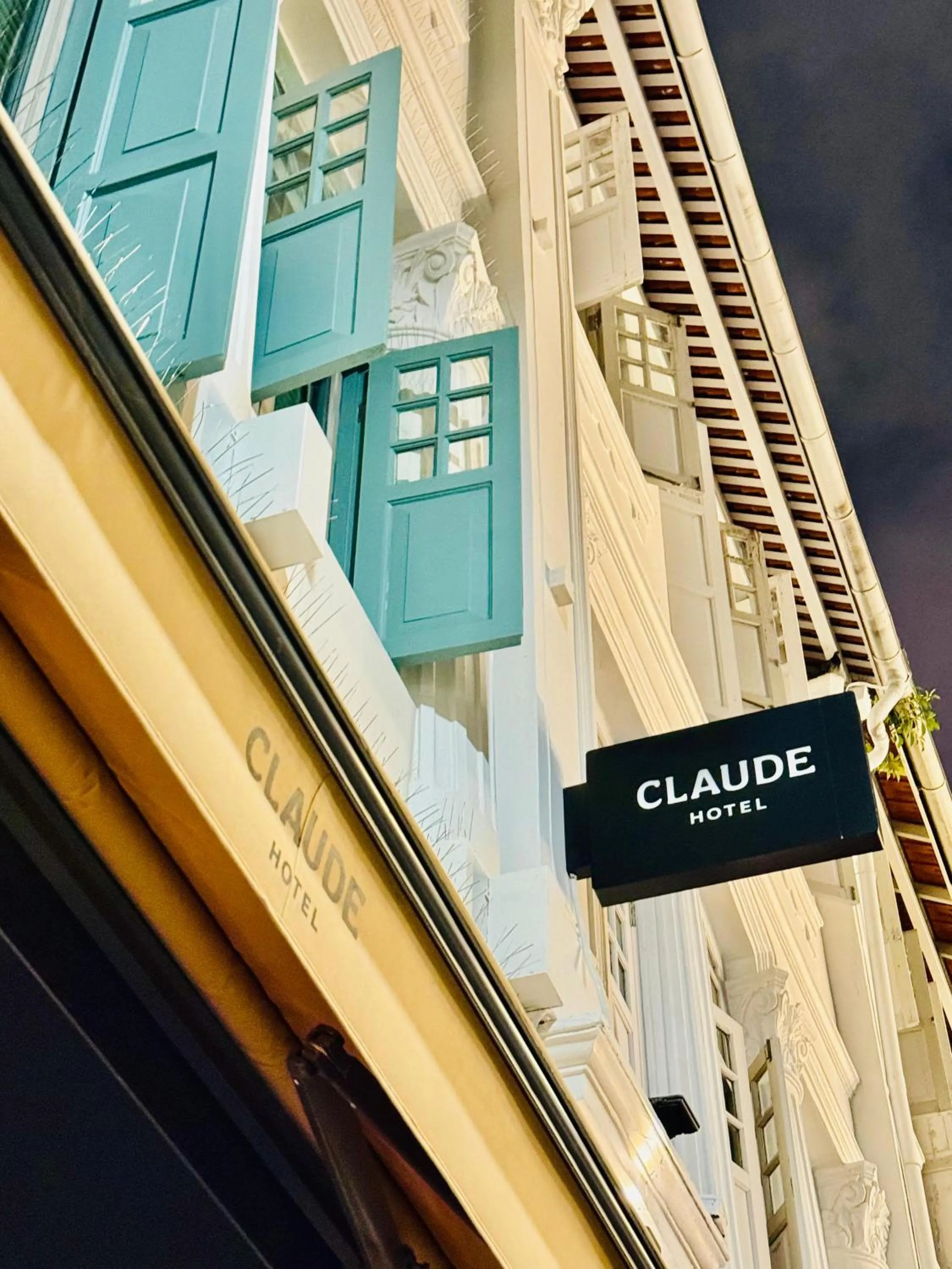 Property logo or sign in Claude Hotel